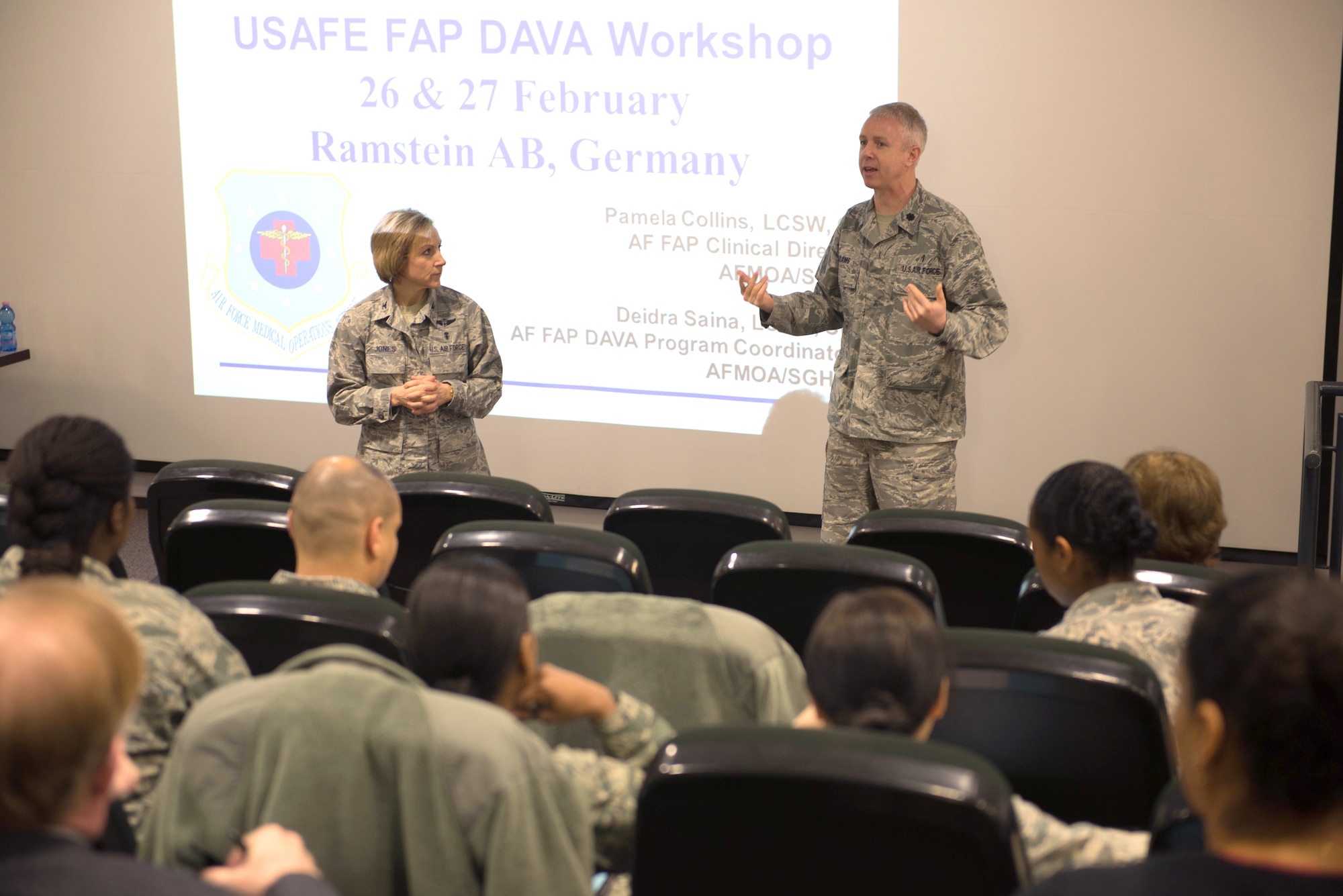 RAMSTEIN AIR BASE, Germany – Col. Barbara Jones, U.S. Air Forces in Europe and Air Forces Africa deputy command surgeon, and Lt. Col. Travis Adams, USAFE-AFAFRICA mental health branch chief, deliver opening remarks during a Domestic Abuse Victim Advocacy Conference at Ramstein Air Base, Germany, Feb. 26, 2015. About 30 Family Advocacy Officers from across USAFE-AFAFRICA attended the conference to refresh their skills for providing advocacy to victims of domestic abuse. In addition to the base services, American Overseas can contact the domestic violence crisis center toll-free 866-USWOMEN or through live chat at www.866uswomen.org. (U.S. Air Force photo/Tech. Sgt. Benjamin Wilson)