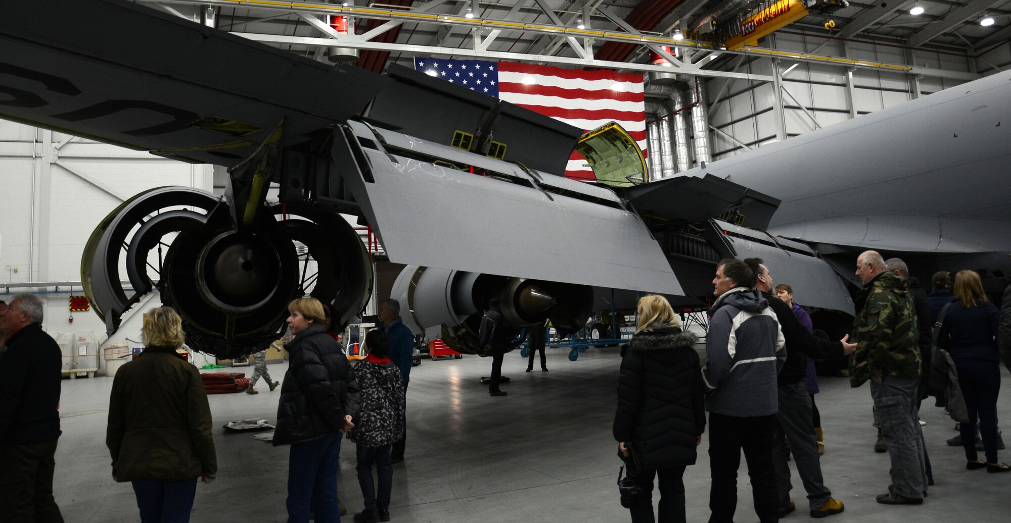 Civilians from the 100th Logistics Readiness Squadron, tour a KC-135 Stratotanker during a Civilian Appreciation Day tour Feb. 27, 2015, on RAF Mildenhall, England. The tour included the fuels sections tour, an aircraft viewing, mobility bag demonstration, a military working dog display and a fire truck viewing. (U.S. Air Force photo by Gina Randall/Released)