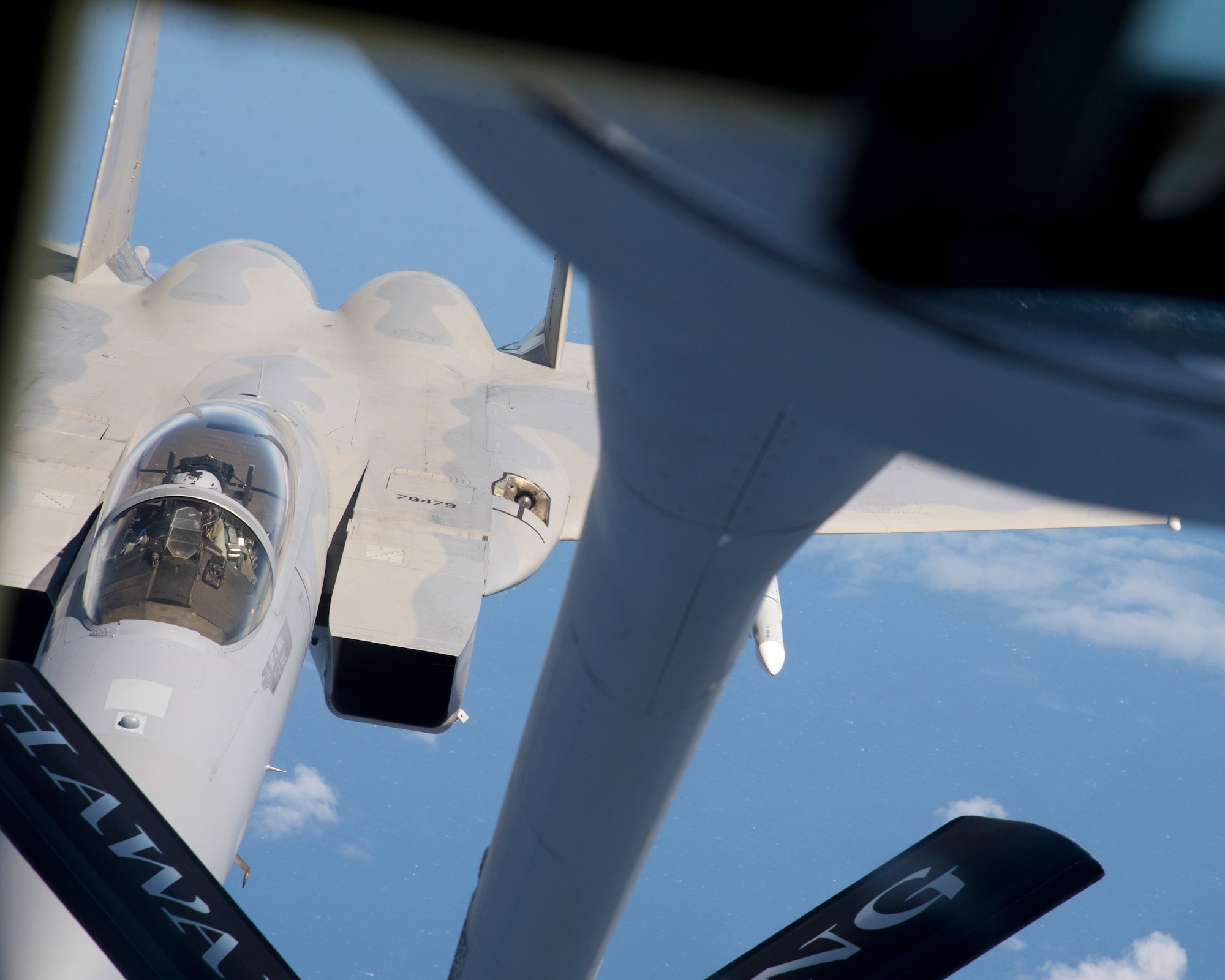A U.S. Air Force F-15 Strike Eagle from the 142nd Fighter Wing, Oregon Air National Guard, prepares to receive fuel during an in-air refueling  from a KC-135R Stratotanker from the 96th Air Refueling Squadron, during the Hawaii Air National Guard’s exercise Sentry Aloha over Hawaii, March. 5, 2015. This is second large-scale “Sentry Aloha” fighter exercise in 2015 hosting 45 aircraft and more than 1,000 servicemen from seven states. (U.S. Air Force photo by Tech. Sgt. Aaron Oelrich/Released)