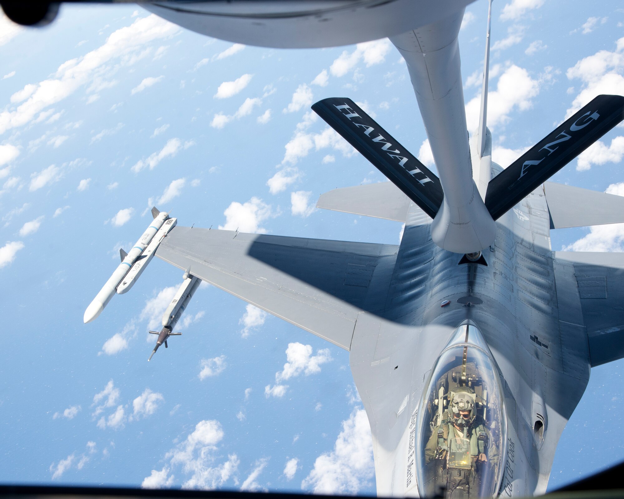 A U.S. Air Force F-16 Fighting Falcon from the 162nd Fighter Wing, Arizona Air National Guard, receives fuel from a KC-135R Stratotanker from the 96th Air Refueling Squadron, during the Hawaii Air National Guard exercises Sentry Aloha over Hawaii, March. 5, 2015. Sentry Aloha is the premier and primary training exercise to prepare multiple elements of the Air National Guard in the mission of homeland defense. (U.S. Air Force photo by Tech. Sgt. Aaron Oelrich/Released)