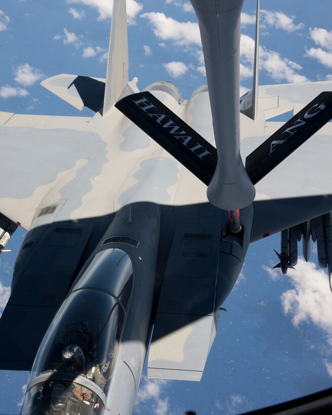 A U.S. Air Force F-15 Strike Eagle from the 142nd Fighter Wing, Oregon Air National Guard, refuels from a KC-135R Stratotanker from the 96th Air Refueling Squadron, during the Hawaii Air National Guard exercise Sentry Aloha over Hawaii, March. 5, 2015. This is second large-scale Sentry Aloha fighter exercise in 2015 hosting 45 aircraft and more than 1,000 servicemen from seven states. (U.S. Air Force photo by Tech. Sgt. Aaron Oelrich/Released)