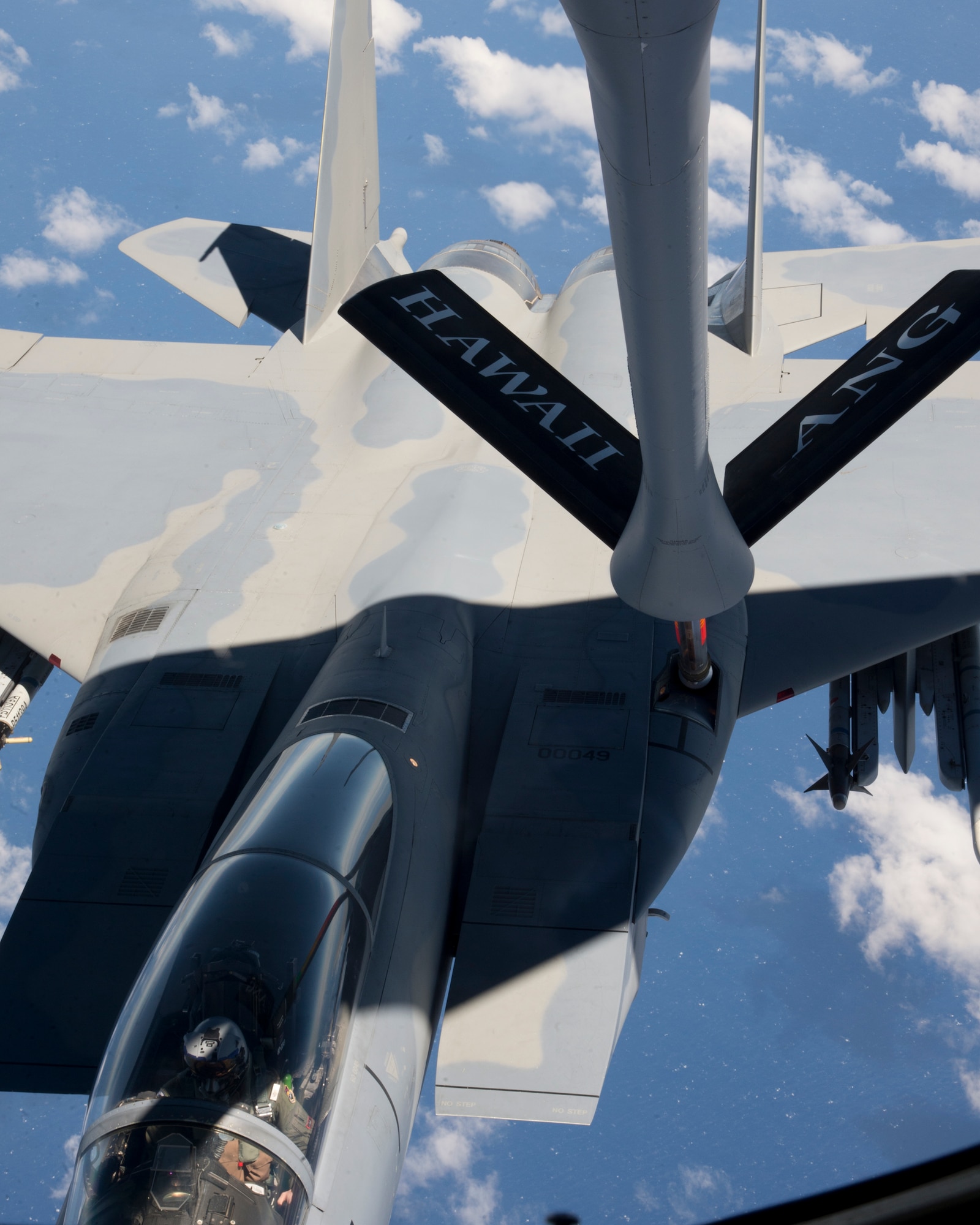 A U.S. Air Force F-15 Strike Eagle from the 142nd Fighter Wing, Oregon Air National Guard, refuels from a KC-135R Stratotanker from the 96th Air Refueling Squadron, during the Hawaii Air National Guard exercise Sentry Aloha over Hawaii, March. 5, 2015. This is second large-scale Sentry Aloha fighter exercise in 2015 hosting 45 aircraft and more than 1,000 servicemen from seven states. (U.S. Air Force photo by Tech. Sgt. Aaron Oelrich/Released)