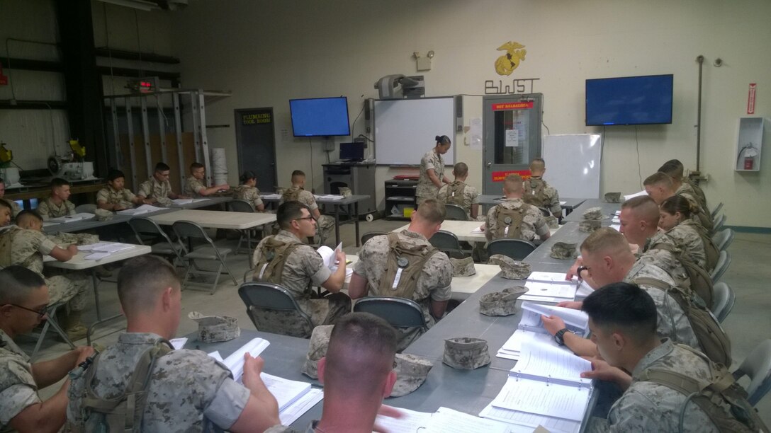 Marines being briefed on electrical support.
