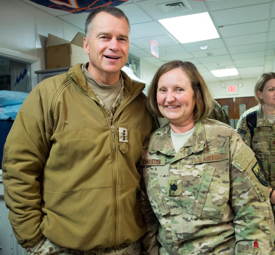 Navy Adm. James A. Winnefeld Jr., left, vice chairman of the Joint Chiefs of Staff, poses for a photograph with Air Force Lt. Col. Hindman, a military member assigned at Heathe N. Craig Joint Theater Hospital, during a USO tour visit on Bagram Airfield, Afghanistan, March 6, 2015.