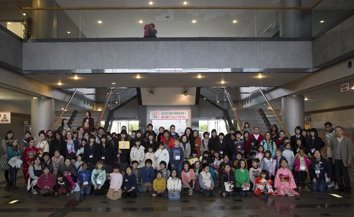 Visitors, volunteers and staff pose for a picture after the closing ceremony at the Hina Doll Festival in Shunan City, Japan, March 7, 2015. Shunan International Children’s Club invited School Age Care aboard Marine Corps Air Station Iwakuni, to celebrate the Hina Doll Festival at the Shinnanyo Fureai Center in Shunan City. The Hina Doll Festival, or Hinamatsuri, is a day in Japan when parents celebrate their daughters’ happiness, growth and good health and is usually held on March 3.