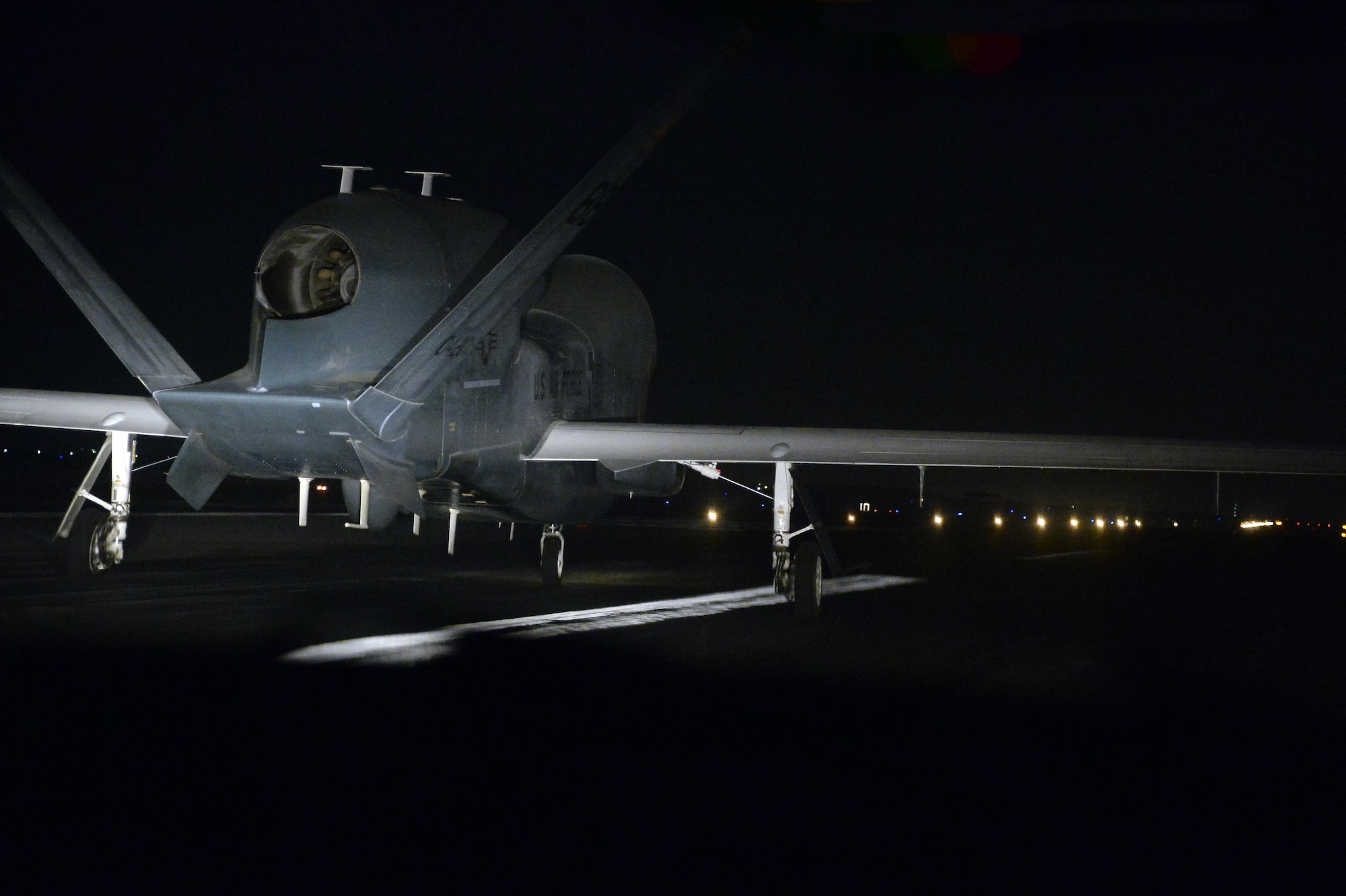 RQ-4 Global Hawk aircraft 2019 taxis prior to takeoff at an undisclosed location in Southwest Asia Mar. 7, 2015. During its service, the aircraft has been providing support to warfighters by relaying communications between people and aircraft as well as enabling airstrikes on the Islamic State of Iraq and the Levant/Da’esh forces. (U.S. Air Force photo/Tech. Sgt. Marie Brown)