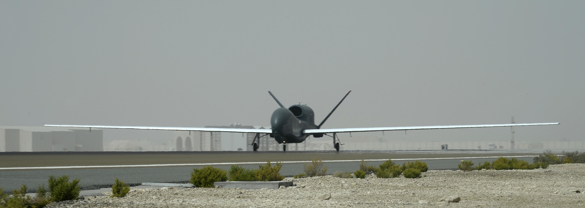 RQ-4 Global Hawk aircraft 2019 lands at an undisclosed location in Southwest Asia Mar. 8, 2015. A2019 flew a 30.5 hour mission in support of Operation Inherent Resolve, surpassing the 10,000 flying hour milestone. A2019 also holds the record for the longest block 20 flight, which lasted 31.5 hours. (U.S. Air Force photo/Tech. Sgt. Marie Brown)