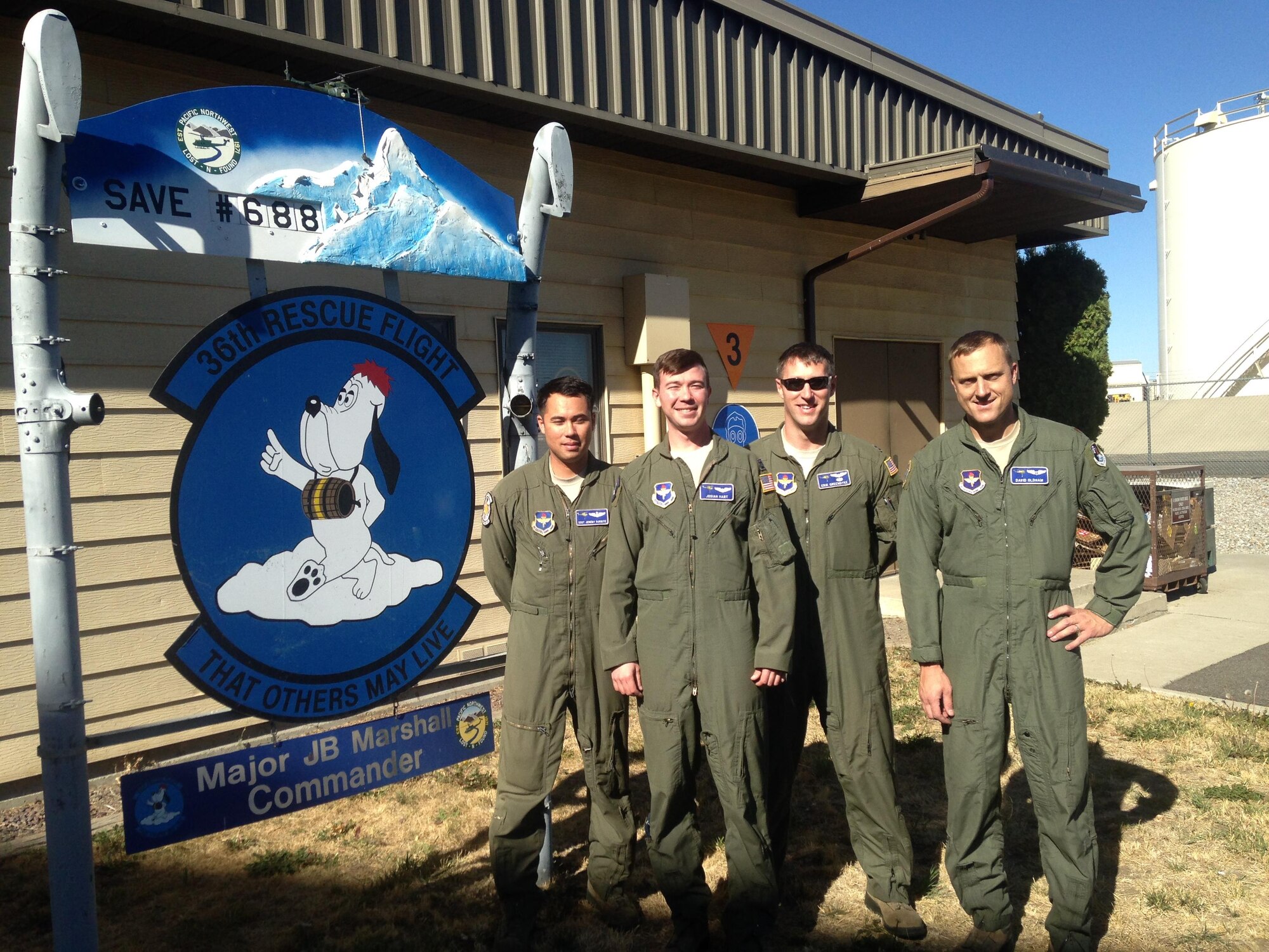 Making its 688th save, the 36th Rescue Flight crew included, from left to right, Staff Sgt. Jeremy Burnite, special missions aviator; Capt. Josiah Hart, co-pilot; Capt. Erik Greendyke, aircraft commander; and Maj. David Oldham, flight surgeon. (Courtesy photo by Maj. Jennings Marshall/ Released)  