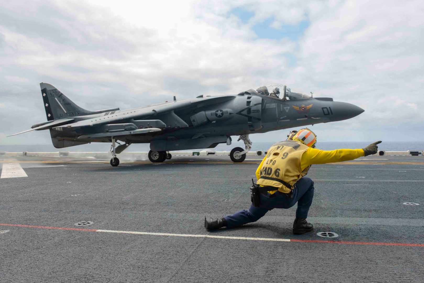 In this file photo, an AV-8B Harrier, assigned to the Marine Attack Squadron 231(VMA), takes off from the flight deck of forward-deployed amphibious assault ship USS Bonhomme Richard (LHD 6). Bonhomme Richard is currently deployed in the U.S. 7th Fleet Area of Operations. 