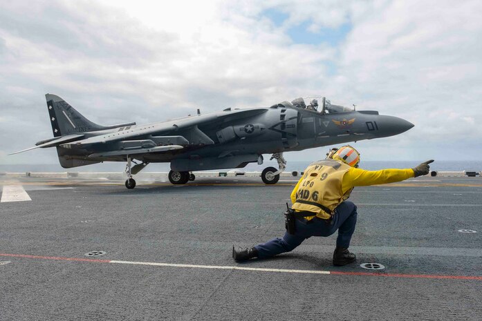 In this file photo, an AV-8B Harrier, assigned to the Marine Attack Squadron 231(VMA), takes off from the flight deck of forward-deployed amphibious assault ship USS Bonhomme Richard (LHD 6). Bonhomme Richard is currently deployed in the U.S. 7th Fleet Area of Operations. 