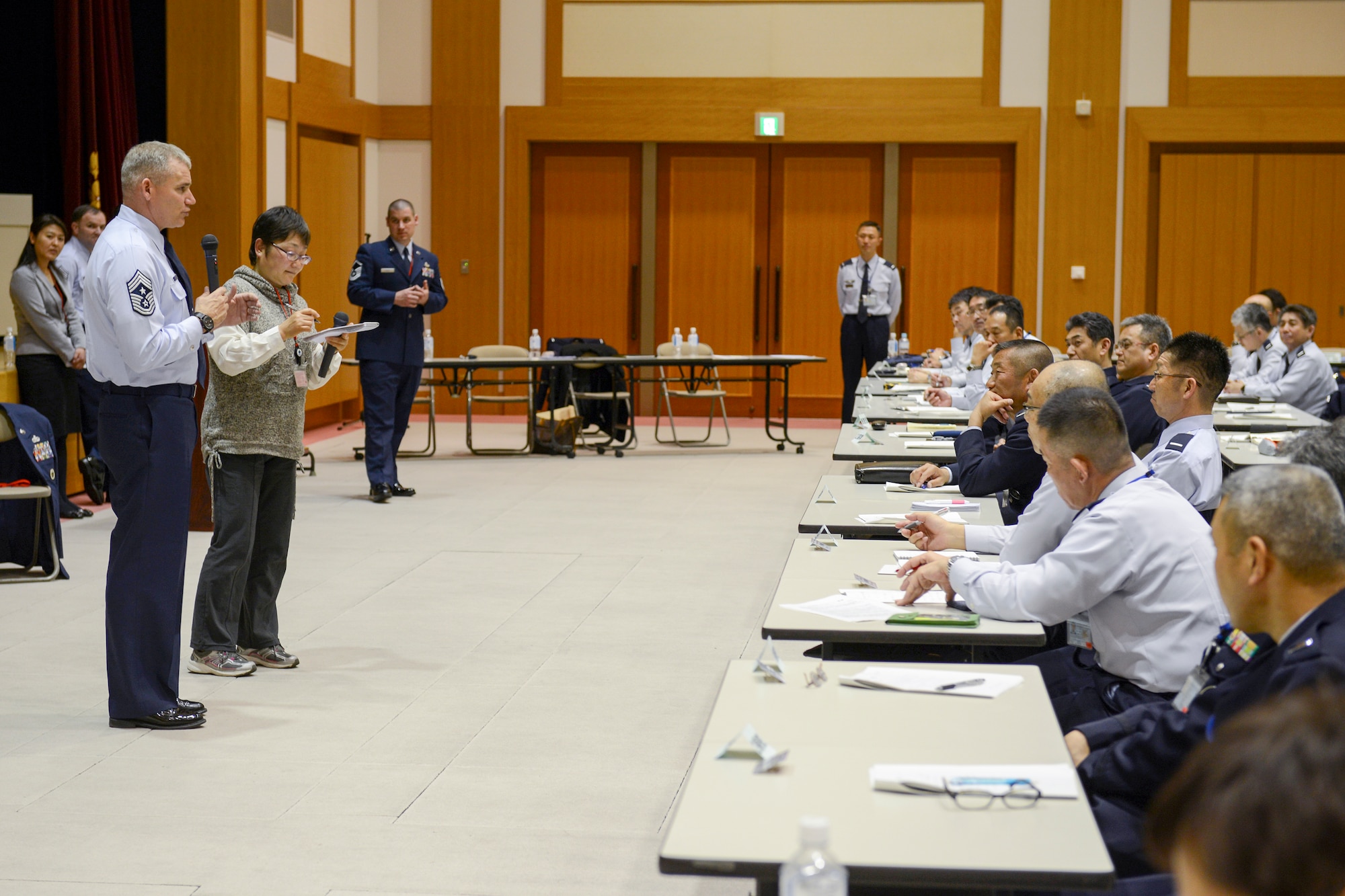 U.S. Forces, Japan and 5th Air Force Command Chief Master Sgt. James Laurent briefs during the annual senior enlisted advisor conferenceat the Ministry of Defense in Tokyo, Japan, March 3, 2015. The Yokota resiliency team shared skills to improve communication between Japan Self-Defense Force leadership and their junior enlisted. (U.S. Air Force photo by Airman 1st Class David C. Danford/Released)