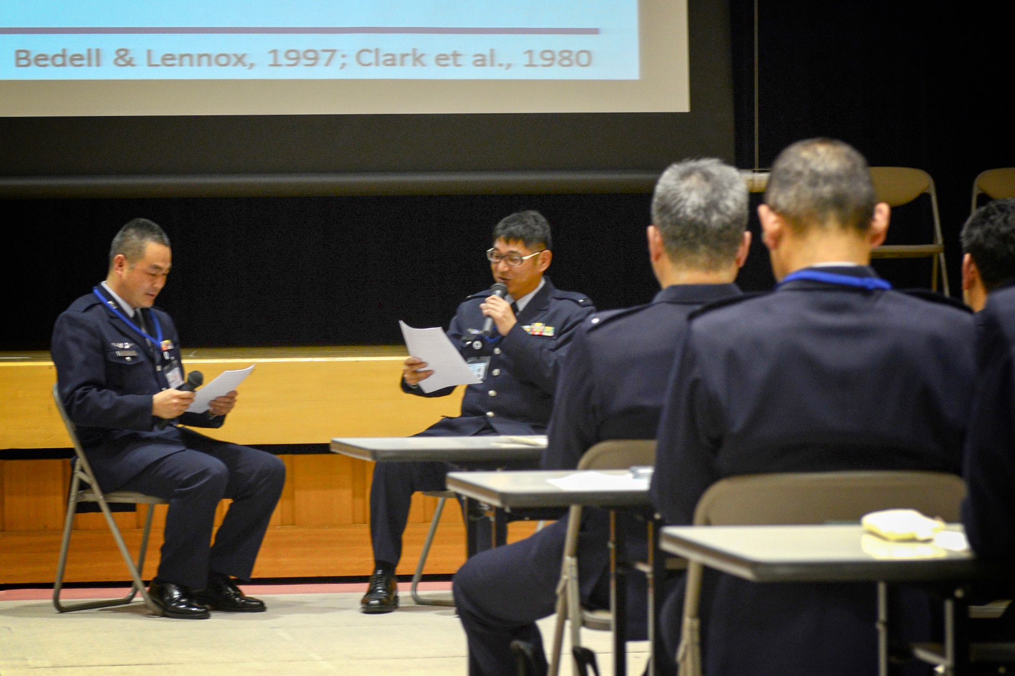 Members from the Japan Air Self-Defense Force demonstrate the interpersonal problem solving technique at the Ministry of Defense in Tokyo, Japan, March 3, 2015. The technique is a five-step process to conflict resolution. (U.S. Air Force photo by Airman 1st Class David C. Danford/Released)