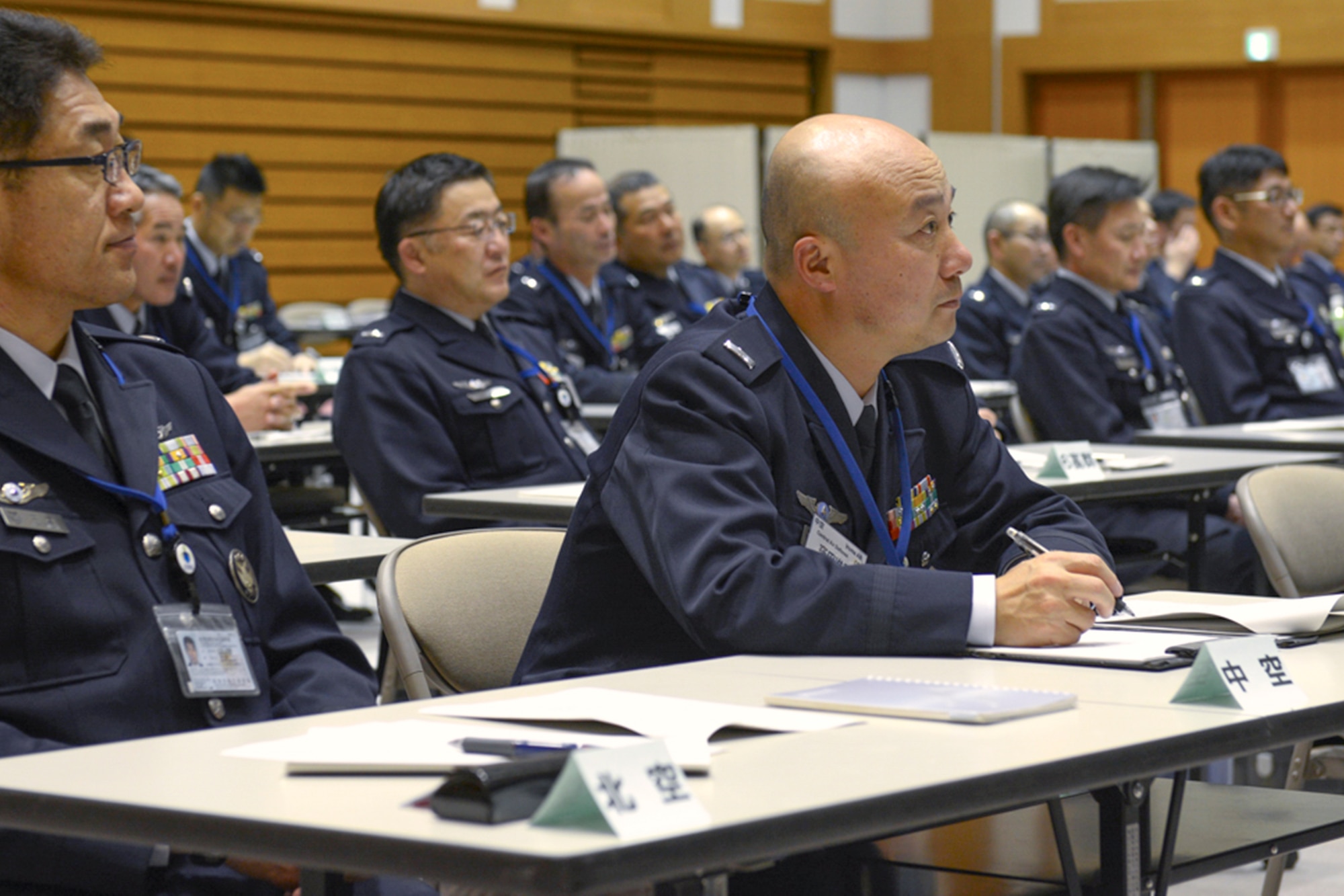 Senior enlisted members from the Japan Air Self-Defense Force listen as Yokota’s resiliency team share skills to improve communication between JSDF leadership and their junior enlisted at the Ministry of Defense in Tokyo, March 3, 2015. Two techniques were taught by the team during the seminar. (U.S. Air Force photo by Airman 1st Class David C. Danford/Released)