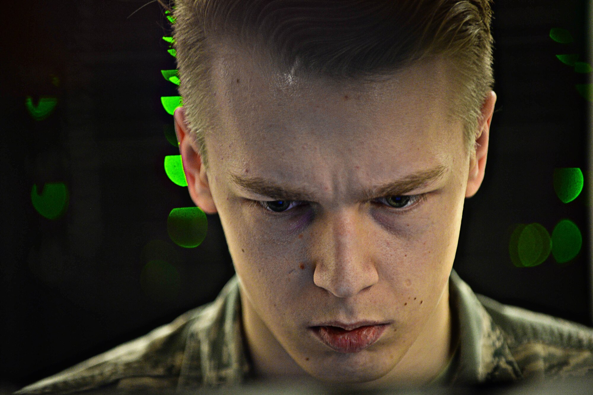 Airman 1st Class Brandon Koch, 28th Communications Squadron cyber systems operator, troubleshoots a server network at Ellsworth Air Force Base, S.D., March 3, 2015. The base network consists of more than 50 servers providing support to base personnel. (U.S. Air Force photo by Airman 1st Class Zachary Hada/Released)