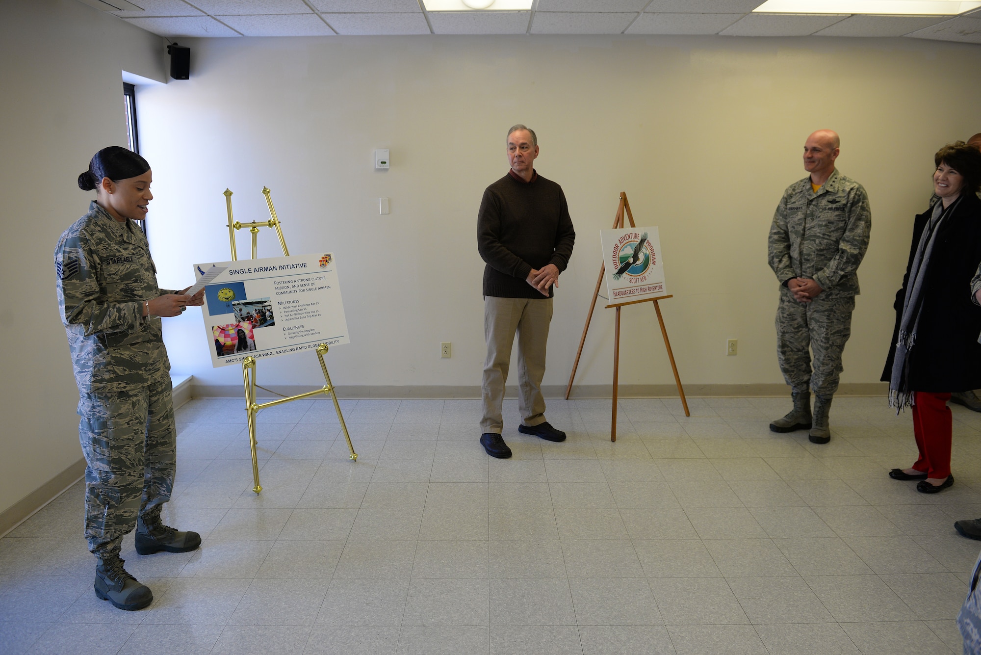 Staff Sgt. Haida StarEagle, a participant in the Single Airmen Initiative program, delivers a testimony to Lt. Gen. Carlton D. Everhart II, 18th Air Force commander, during his visit at Scott Air Force Base, Illinois, March 6, 2015. The SAI program is meant to promote outdoor activities for Airmen, especially those living in the dorms, and StarEagle attributes it to having a more enriching experience at the bases she has been stationed that have the program. (U.S. Air Force photo by Airman 1st Class Erica Crossen)