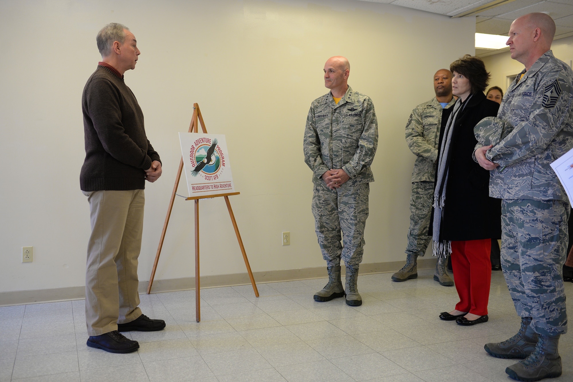 Garry Green, 375th Force Support Squadron Outdoor Recreation Single Airmen Initiative Program Coordinator, briefs Lt. Gen. Carlton D. Everhart II, 18th Air Force commander, during his visit at Scott Air Force Base, Illinois, March 6, 2015. The SAI program is meant to promote outdoor activities for Airmen, especially those in the dorms. (U.S. Air Force photo by Airman 1st Class Erica Crossen)