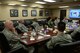 Lt. Gen. Carlton D. Everhart II, 18th Air Force commander, listens to a mission brief during a visit to 375th Air Mobility Wing at Scott Air Force Base, Illinois, March 6, 2015. Everhart inquired about issues that the wing is currently handling, and listened to plans for the future from the wing and group commanders. (U.S. Air Force photo by Airman 1st Class Erica Crossen)