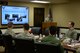 Staff Sgt. Jordan Herrera, 375th Medical Support Squadron, gives a briefing during the 18th Air Force commander’s visit to 375th Air Mobility Wing at Scott Air Force Base, Illinois, March 6, 2015. Herrera covered the mission of the different organizations and how they all work together to achieve rapid global mobility. (U.S. Air Force photo by Airman 1st Class Erica Crossen)