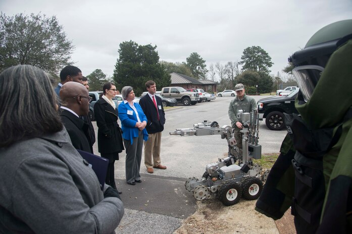 Joint Base Charleston’s newest Honorary Commanders view an explosive ordnance disposal demonstration during their orientation at JB Charleston, S.C., March 6, 2015. The JB Charleston Honorary Commanders Program encourages an exchange of ideas, experiences, and friendship between key members of the local civilian community and the Charleston military community. The program provides a unique opportunity for the members of the Charleston area to shadow commanders of the Air Force wings and groups, as well as Navy and tenant units at JB Charleston. (U.S. Air Force photo/Senior Airman George Goslin)