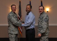 The 2014 Eighth Air Force Category II GS 9 and above Civilian of the Year - Mr. George Broadie, 608th Strategic Operations Squadron. (U.S. Air Force photo/Senior Airman Joseph Raatz)
