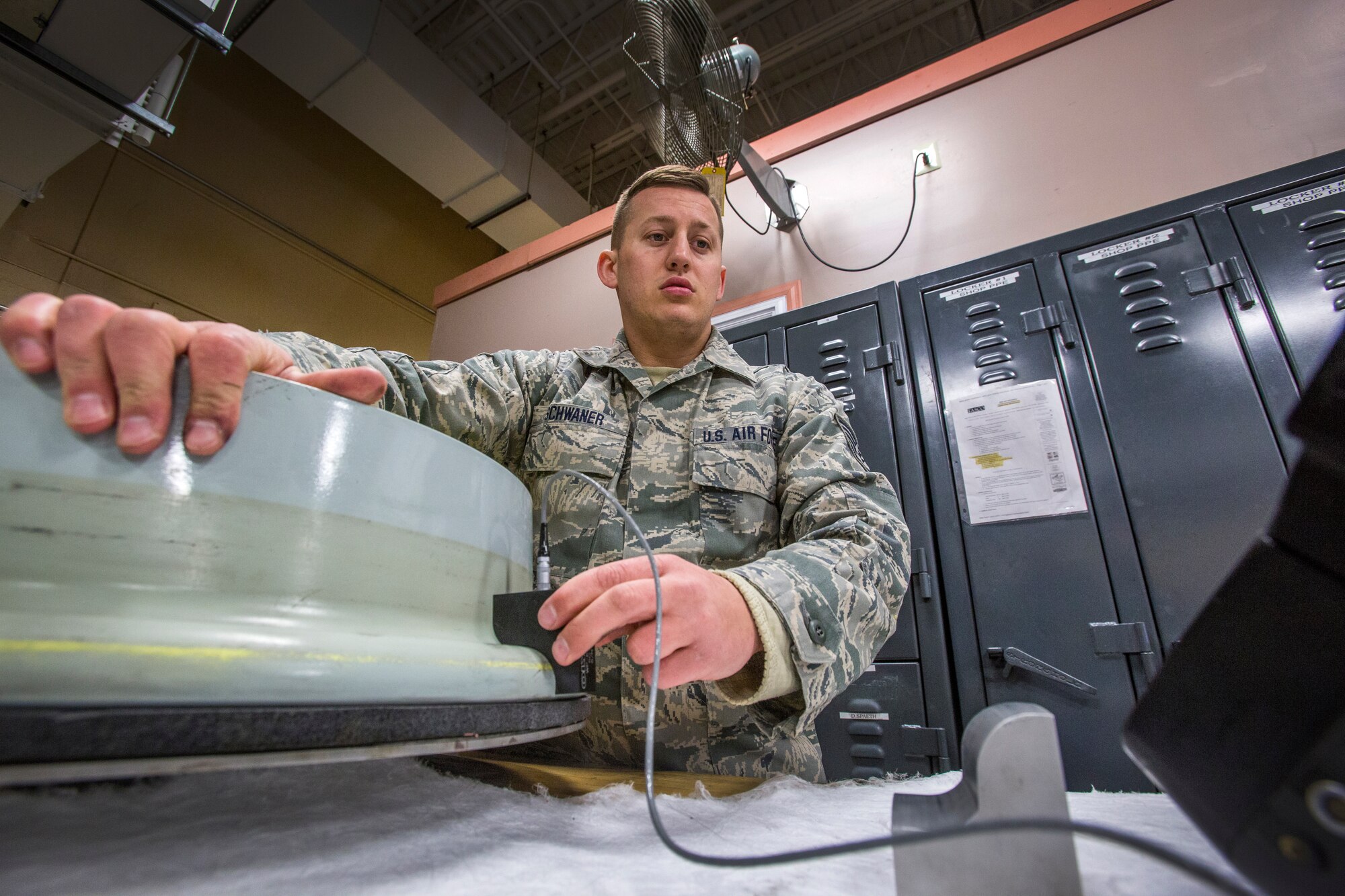 Staff Sgt. Dean C. Schwaner, non-destructive inspection craftsman, 108th Wing, performs an eddy current inspection on the nose landing gear wheel rims of the Wing’s KC-135R Stratotankers at Joint Base McGuire-Dix-Lakehurst, N.J., March 7, 2015. The New Jersey Air National Guard NDI Airmen provide support to the structural maintenance program, which ensures that the Stratotankers are mission-ready. (U.S. Air National Guard photo by Master Sgt. Mark C. Olsen/Released)