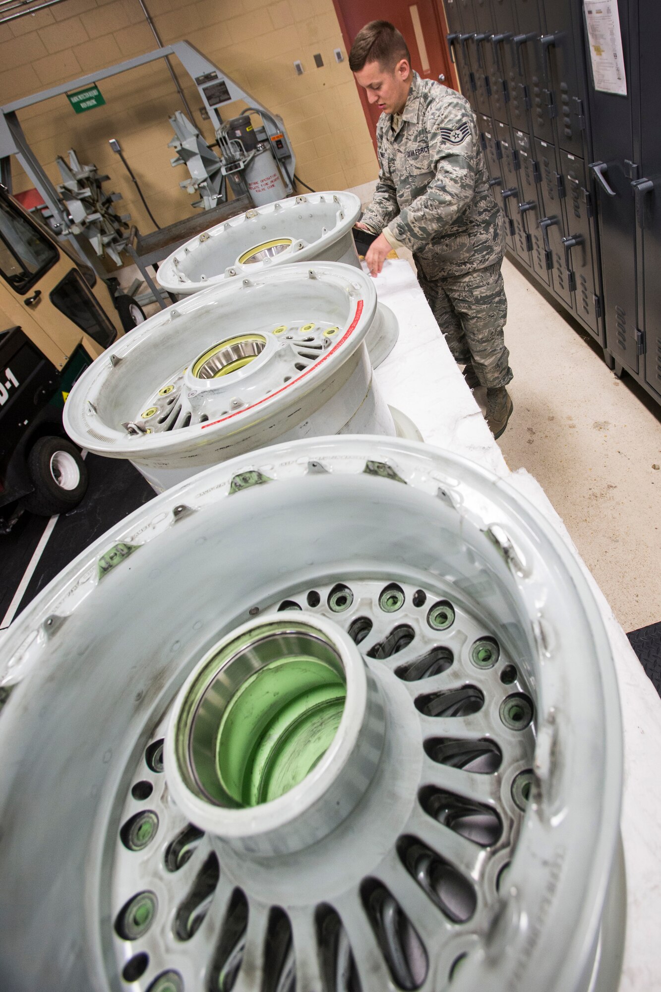 Staff Sgt. Dean C. Schwaner, non-destructive inspection craftsman, 108th Wing, prepares to perform an eddy current inspection on the KC-135R Stratotankers’ nose landing gear wheel rims at Joint Base McGuire-Dix-Lakehurst, N.J., March 7, 2015. The New Jersey Air National Guard NDI Airmen provide support to the structural maintenance program, which ensures that the Stratotankers are mission-ready. (U.S. Air National Guard photo by Master Sgt. Mark C. Olsen/Released)