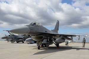 A crew chief, 148th Fighter Wing, Duluth, Minn. prepares a Block 50, F-16 for take-off during a Sentry Savannah training exercise, Feb 10, 2015, Savannah, Ga.  The Sentry Savannah training exercise allows fighter pilots to participate in war simulations that depict what they would face in a real world scenario.  (U.S. Air National Guard photo by Master Sgt. Ralph Kapustka/Released)
