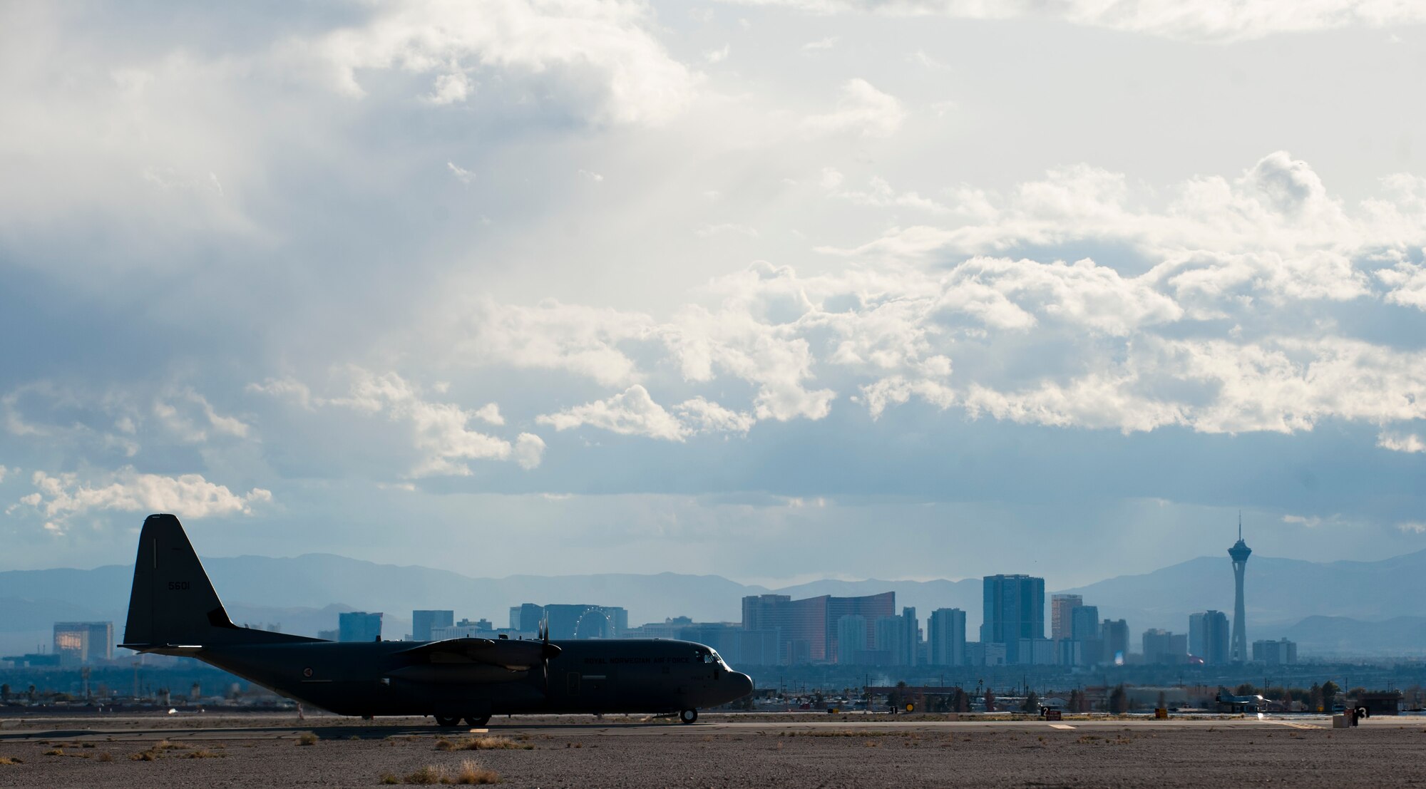 A Royal Norwegian Air Force C-130J Super Hercules taxis off the runway after a returning from a training mission during Red Flag 15-2 at Nellis Air Force Base, Nev., March 3, 2015. All four branches of the U.S. military and air forces from allied nations participate in Red Flag exercises held three to four times each year. This is done to familiarize forces that may have to work together in future operations with each other’s mission capabilities. (U.S. Air Force photo by Senior Airman Thomas Spangler)