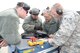 Senior Airman Rick Petcoff, Master Sgt. Rick Cornelison, Master Sgt. Wayne Gressman and Airman 1st Class Tanner Beckwith, 148th Fighter Wing, Duluth, Minn. work on a Block 50 F-16  during a Sentry Savannah training exercise, Feb 10, 2015, Savannah, Ga.  The Sentry Savannah training exercise allows fighter pilots to participate in war simulations that depict what they would face in a real world scenario.  (U.S. Air National Guard photo by Master Sgt. Ralph Kapustka/Released)