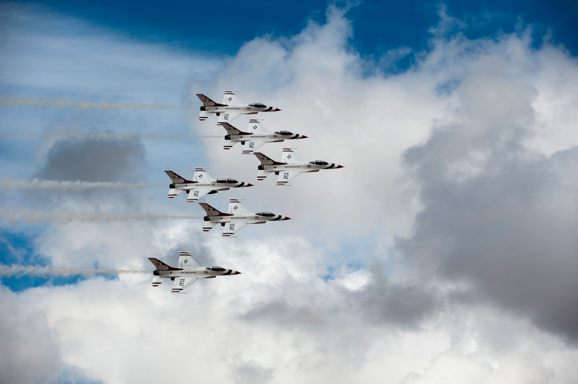 The U.S. Air Force Air Demonstration Team, the Thunderbirds, perform their demonstration in preparation for the commander of Air Combat Command at Nellis Air Force Base, Nev., March 2, 2015. Since the team’s inception, 325 officers have worn the distinguished emblem of ‘America’s Ambassadors in Blue.’ Through selfless dedication, a desire to excel and a constant commitment to improvement, these leaders have channeled their efforts into making the Thunderbirds what they are today. (U.S. Air Force photo by Senior Airman Thomas Spangler)