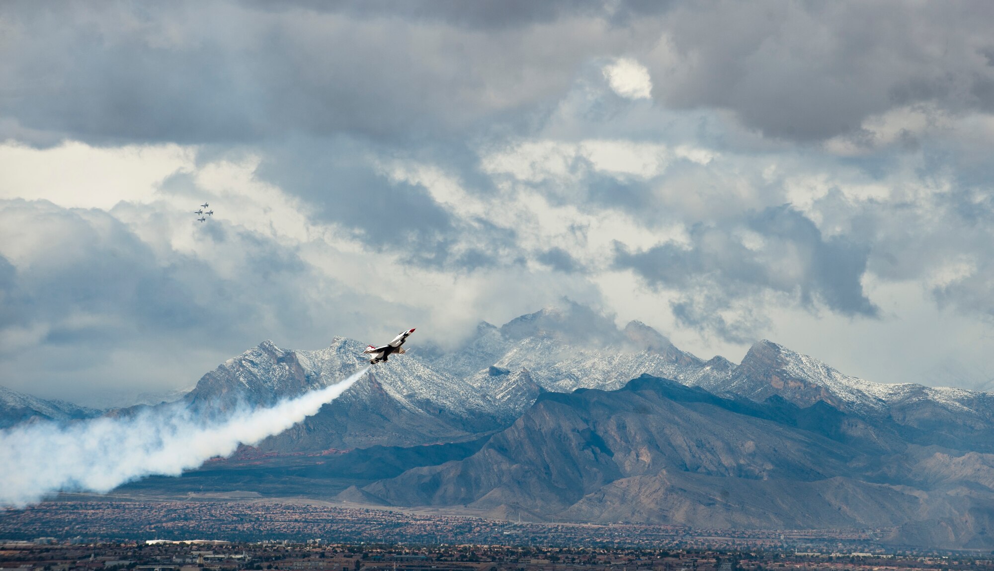 The U.S. Air Force Air Demonstration Team, the Thunderbirds, perform their demonstration in preparation for the commander of Air Combat Command at Nellis Air Force Base, Nev., March 2, 2015. The Thunderbirds perform their show several times a year at multiple locations across the United States. The solo pilots integrate their own loud and proud routine, exhibiting some of the maximum capabilities of the F-16 Fighting Falcon, the Air Force’s premier multi-role fighter jet. (U.S. Air Force photo by Senior Airman Thomas Spangler)
