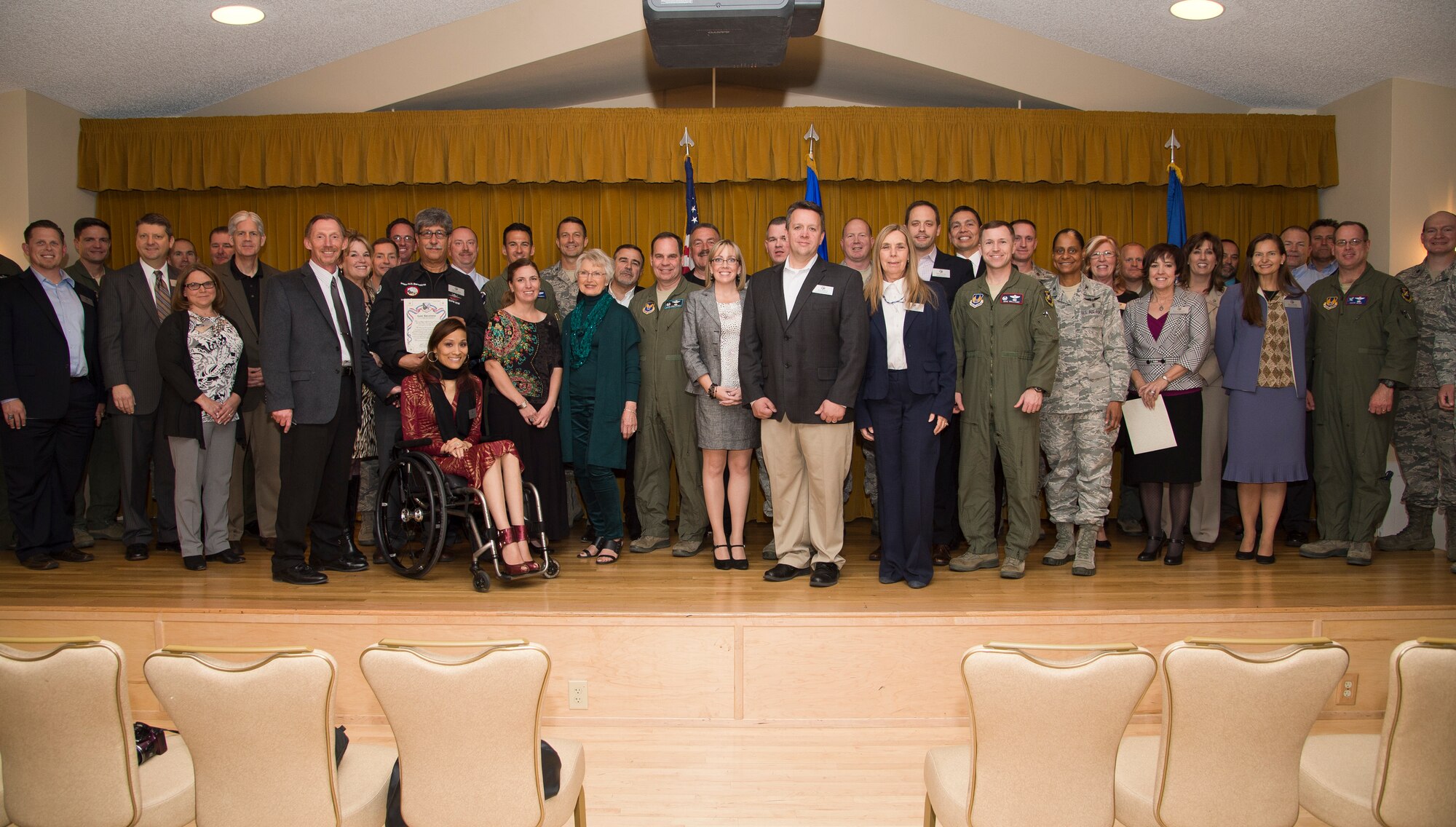 The 412th Test Wing hosted its annual Honorary Commanders Induction Ceremony at Club Muroc March 4, 2015. The objective of the Honorary Commanders Program is to provide Edwards commanders with the capability to develop, promote and maintain a continuous working partnership with the surrounding communities. It helps to familiarize community leaders with Edwards' operations by pairing them with unit commanders and directors at both social and official functions. (U.S. Air Force photo by Ethan Wagner)
