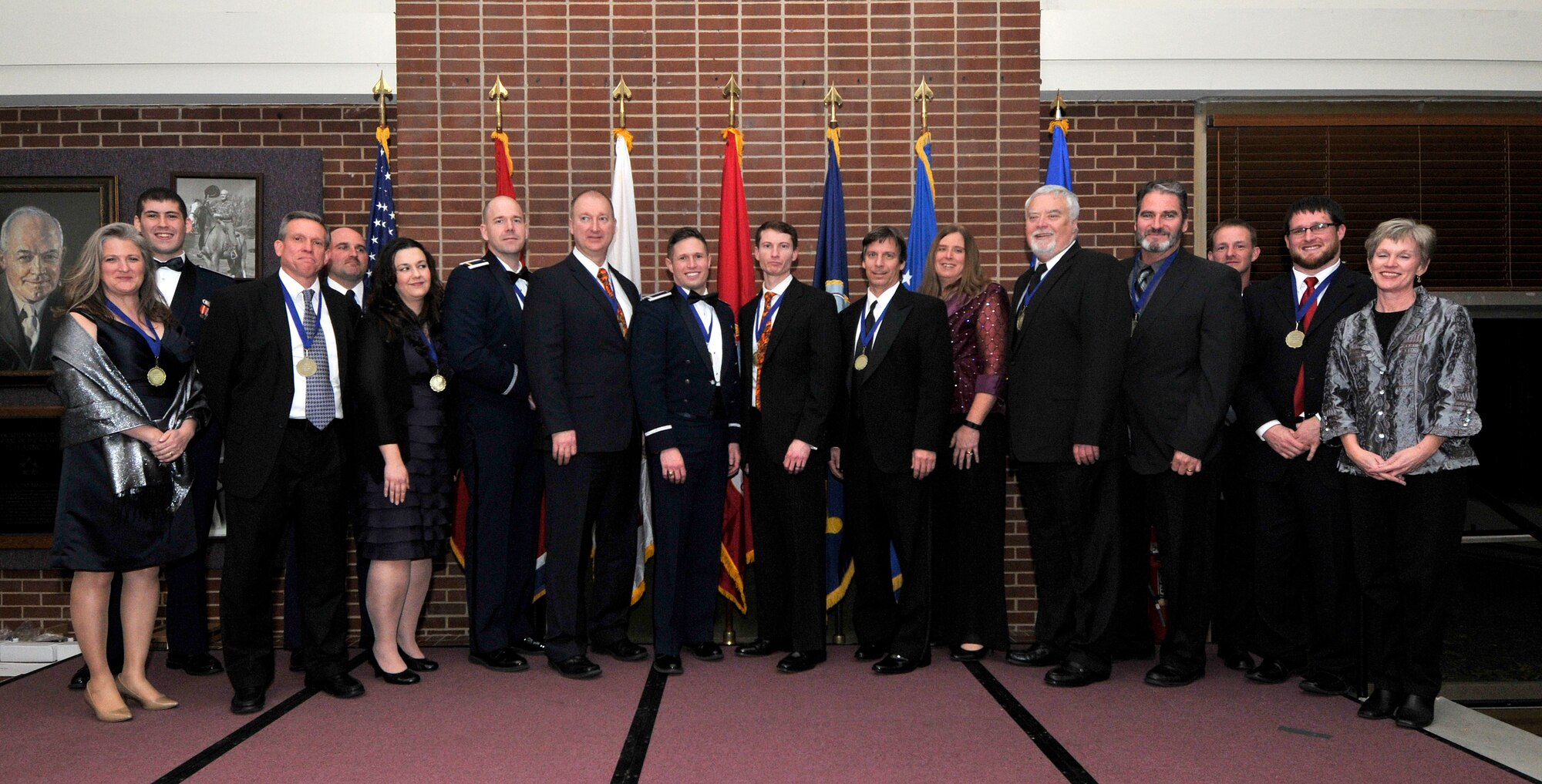 AEDC military and civilian government award winners and nominees were recently recognized for their outstanding contributions to the Complex’s mission at the AEDC Annual Awards Banquet held at the Arnold Lakeside Center. Pictured left to right is Rebecca Gardner, 2nd Lt. Chris Handy, Eric Yatsko, Master Sgt. Jeremy Dinsmore, Melissa Tate, 2nd Lt. Andrew Spurgeon, John Kelly, 1st Lt. Samuel Stephens, Joshua Hartman, Dr. Donald Malloy, Leslie McGowan, Dr. Milt Davis Jr., Kelly Pitts, Charles Evans Jr., Christopher Fanning and Amy Foster.