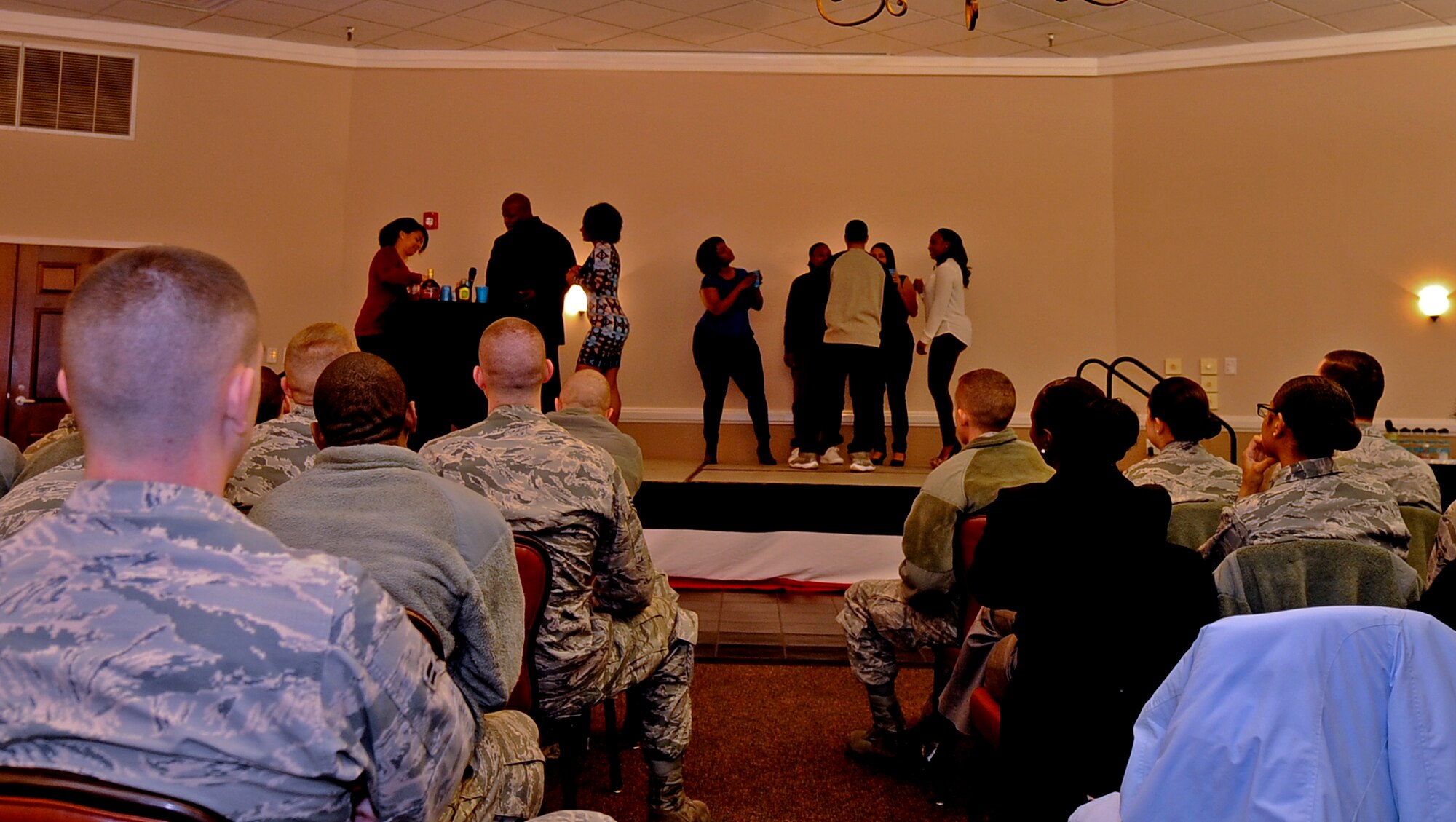 Actors from the new Sexual Assault Theater Group answer questions from the audience at Barksdale Air Force Base, La., March 5, 2015. The characters help promote discussions from Airmen on the different types of situations and how they can be avoided or handled. (U.S. Air Force photo/Staff Sgt. Jason McCasland)