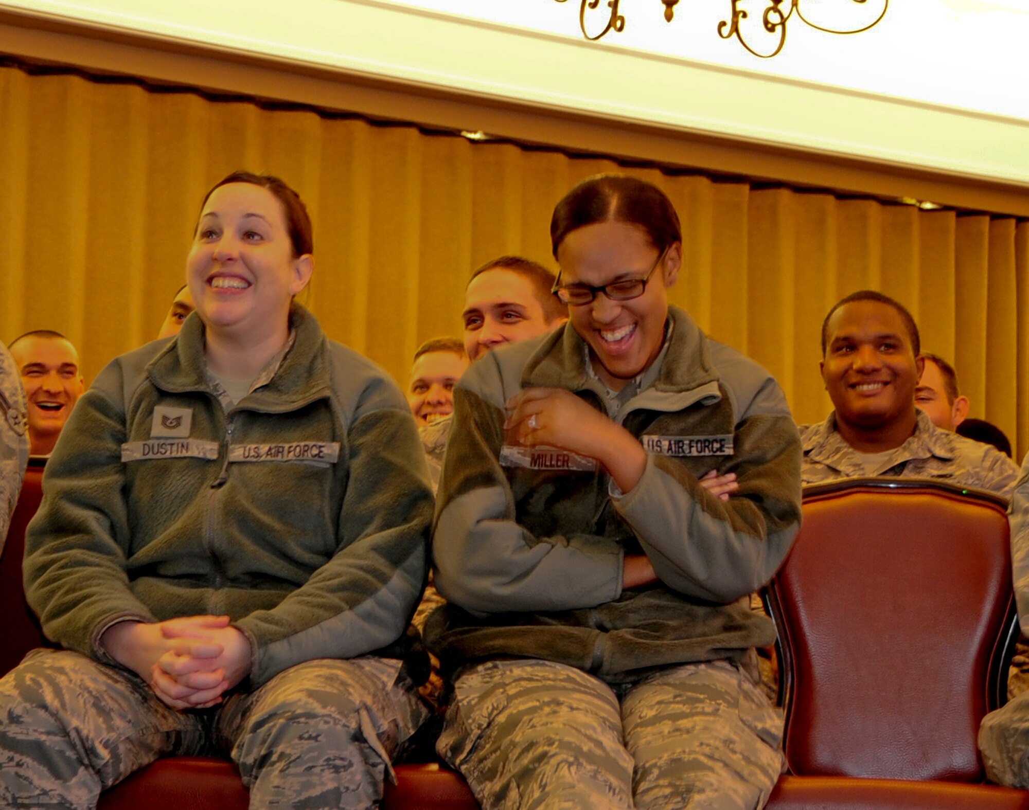 Airmen from the 2nd Logistics Readiness Squadron enjoy the new Sexual Assault Theater Group's production at Barksdale Air Force Base, La., March 5, 2015. The STAG gives a new twist to the Air Force standard sexual assault briefings and training. By using real-life situations it helps Airmen to be more aware and vigilant in preventing sexual assaults. (U.S. Air Force photo/Staff Sgt. Jason McCasland)