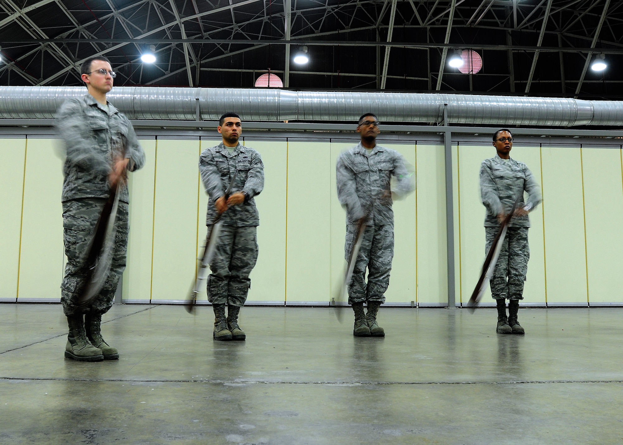 Incirlik Air Base Honor Guard guardsmen practice drill movements March 5, 2015, at Incirlik Air Base, Turkey. The Airmen must exhibit professionalism and strict discipline at all times while performing their duties as guardsmen. (U.S. Air Force photo by Senior Airman Krystal Ardrey/Released)