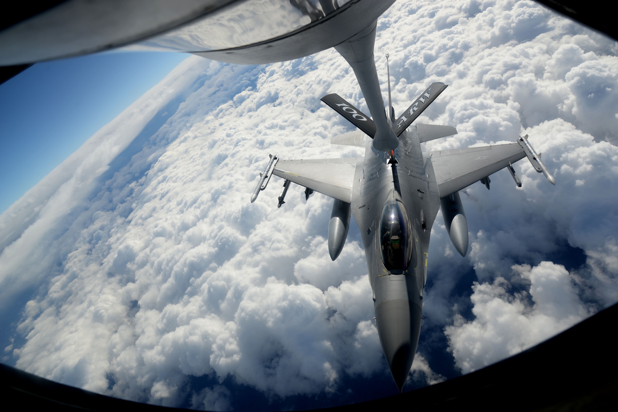 A KC-135 Stratotanker from the 100th Air Refueling Wing, RAF Mildenhall, England, refuels an F-16 Fighting Falcon from the 31st Fighter Wing, Aviano Air Base, Italy, March 4, 2015, during Exercise Iron Hand over southern France. The aircraft were participating in a combined training event designed to enhance interoperability between the two wings and refine techniques and procedures. This type of planned, routine training allows a key opportunity for U.S. Air Forces in Europe – Air Forces Africa wings to work with each other to ensure assets are ready to conduct real-world missions effectively and efficiently when called upon. (U.S. Air Force photo by Senior Airman Kate Maurer/Released)