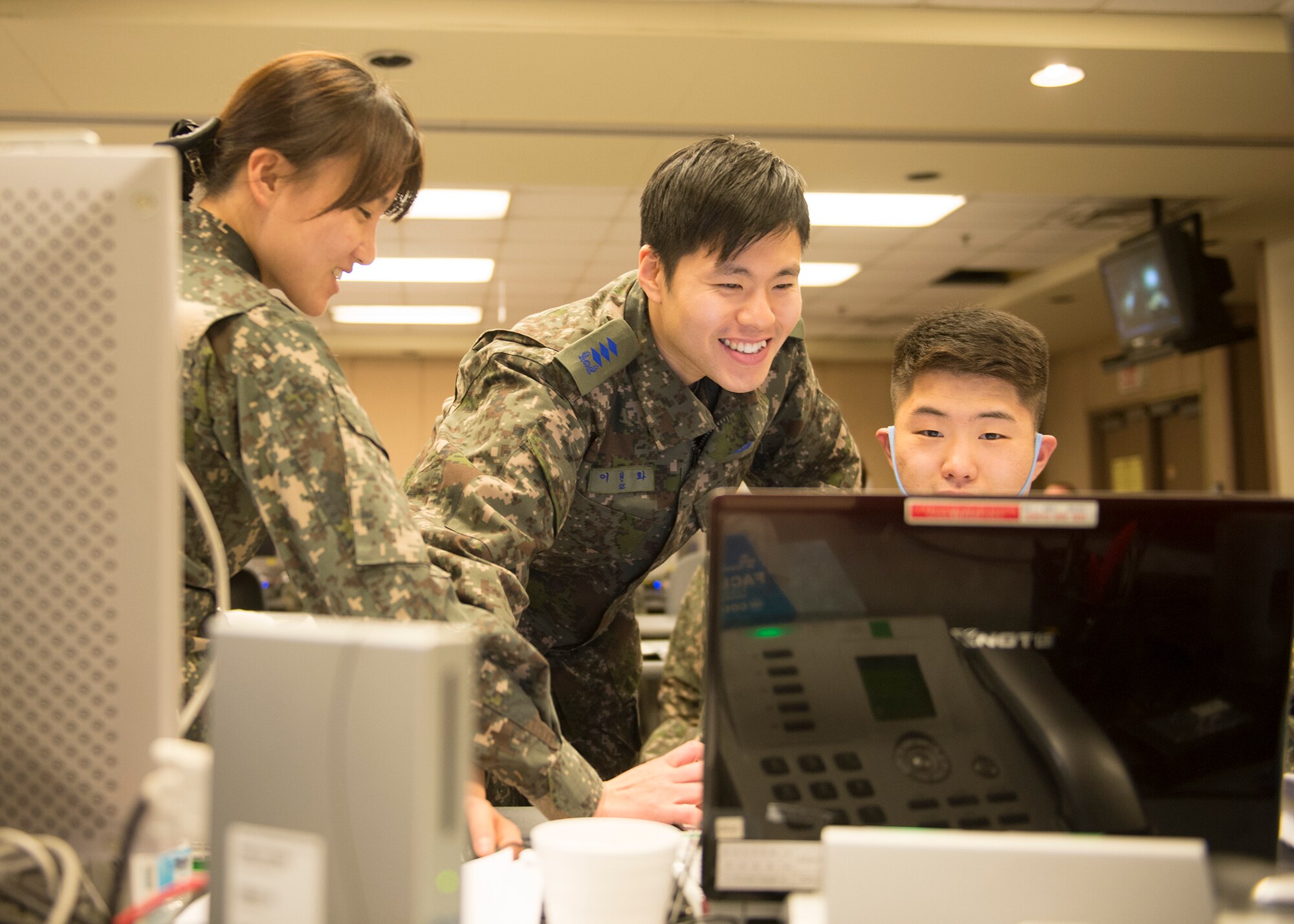 Republic of Korea (ROK) air force airmen work on logistics March 9, 2015, for exercise Key Resolve at the Republic of Korea Air Force Simulation Center at Osan Air Base, Republic of Korea. The exercise provides an opportunity for ROK and U.S. service members to improve communication and share best practices for future operations. (U.S. Air Force photo by Staff Sgt. Shawn Nickel/Released)