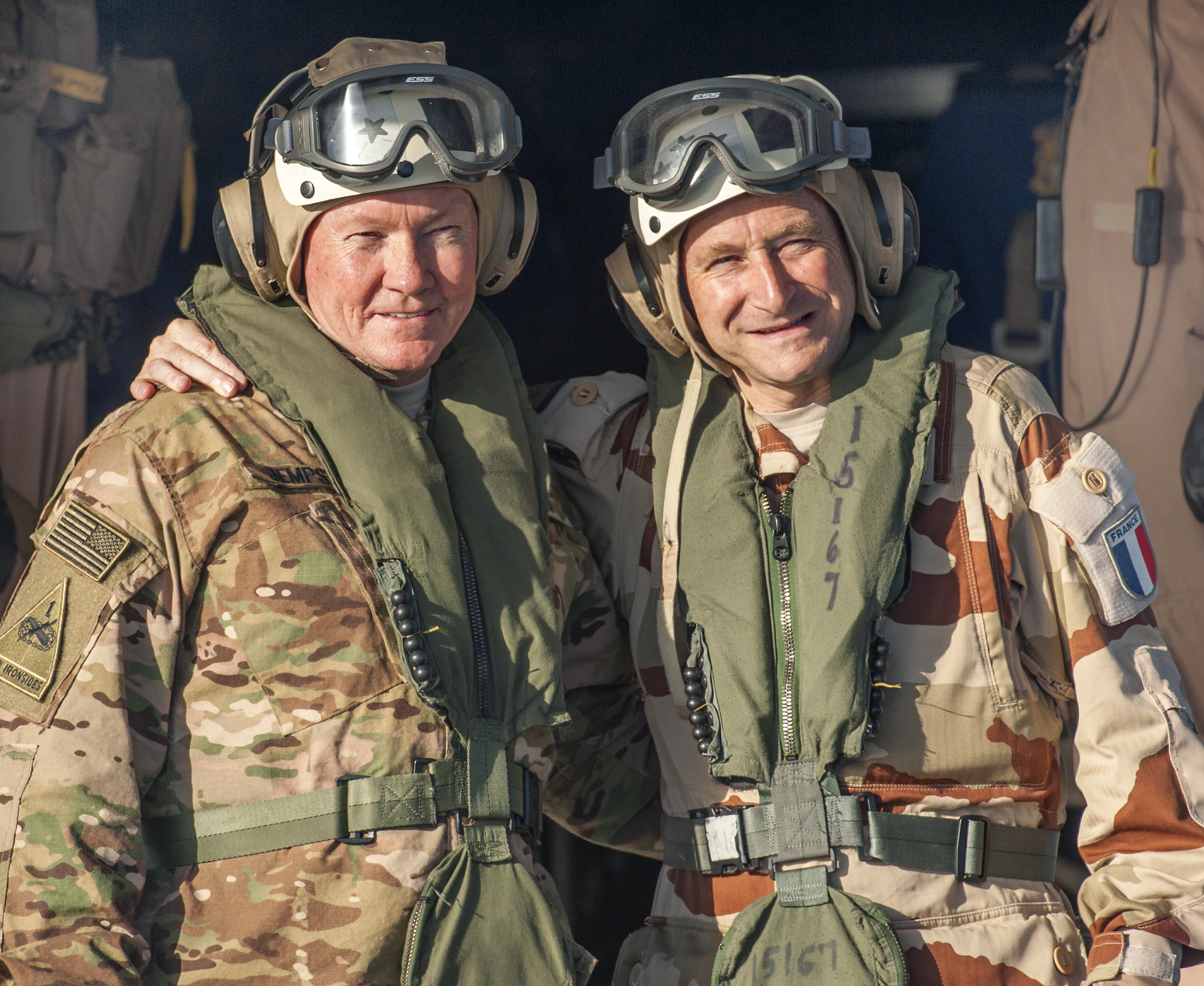 U.S. Army Gen. Martin E. Dempsey, left, chairman of the Joint Chiefs of  Staff, and French