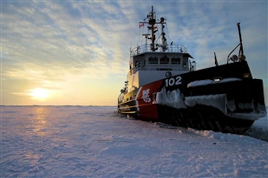 Coast Guard Cutter Bristol Bay sits still in the middle of Lake Erie as its crew takes a short break to view the ice, March 8, 2015. The ship is on ice-breaking duties as part of Operation Coal Shovel. The ship and crew are working along with the Canadian Coast Guard Ship Griffon, escorting another vessel through a frozen Lake Erie.