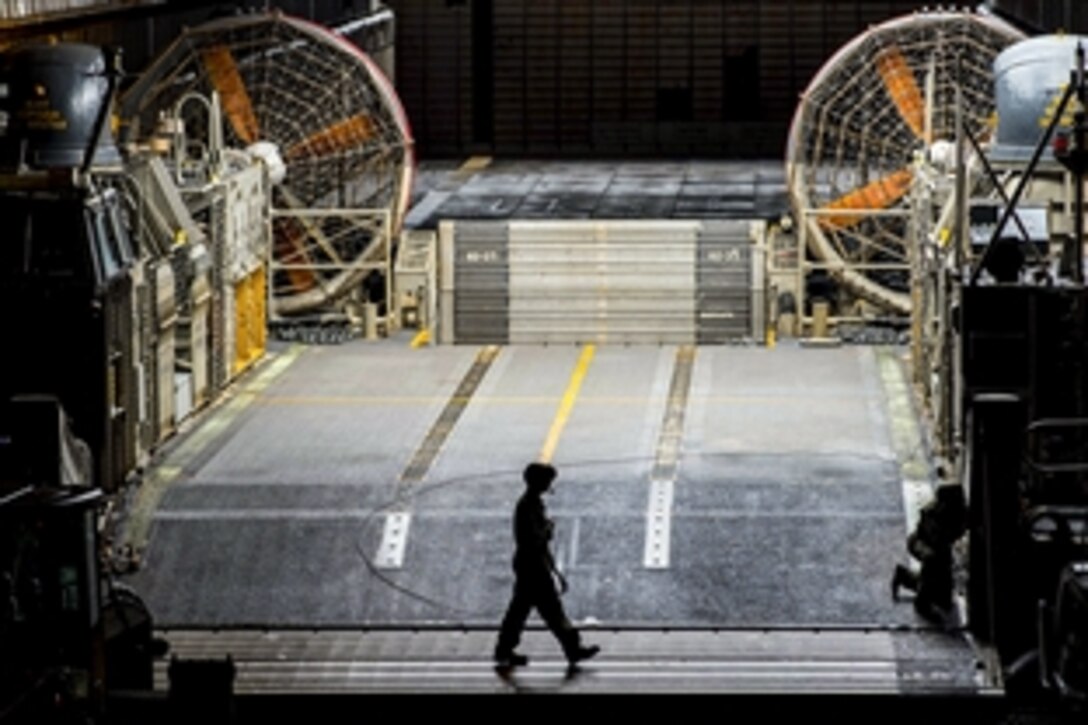 A landing craft air cushion sits in the well deck of the forward-deployed amphibious dock landing ship USS Ashland in the East China Sea, March 9, 2015. The Ashland is currently underway in the U.S. 7th Fleet area of responsibility. The landing craft is part of the Naval Beach Unit 7.