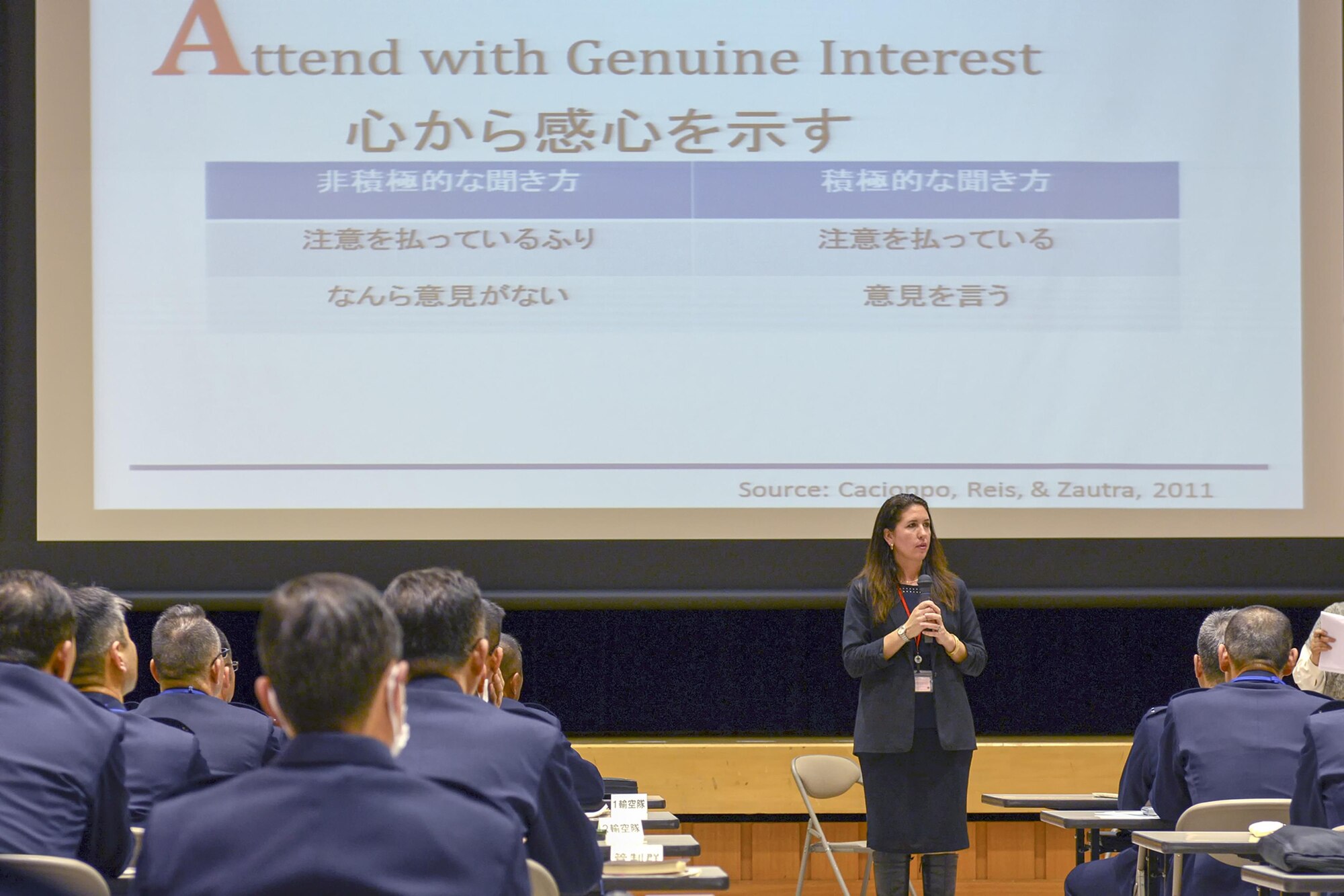 Micaela Alexander briefs Japan Self-Defense Forces members on ‘good listening’ practices March 3, 2015, at the Ministry of Defense in Ichigaya, Japan. Yokota Air Base’s resiliency team shared their skills with JSDF members as part of an annual seminar. Alexander is a 374th Airlift Wing community support coordinator. (U.S. Air Force photo/Airman 1st Class David C. Danford)