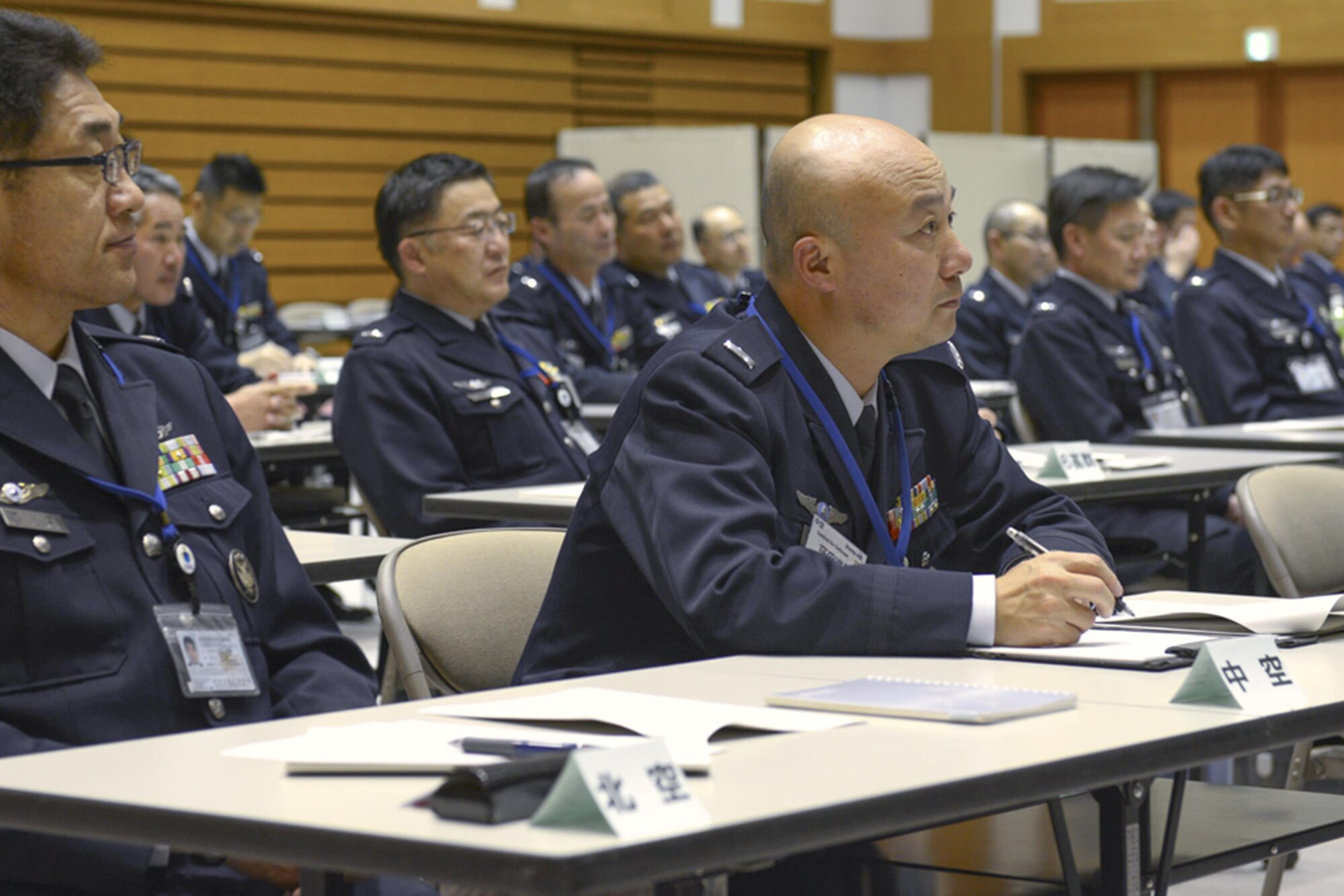 Senior enlisted members from the Japan Air Self-Defense Force listen as Yokota Air Base’s resiliency team share skills to improve communication between JSDF leadership and their junior enlisted March 3, 2015, at the Ministry of Defense in Ichigaya, Japan. Two techniques were taught by the team during the seminar. (U.S. Air Force photo/Airman 1st Class David C. Danford) 