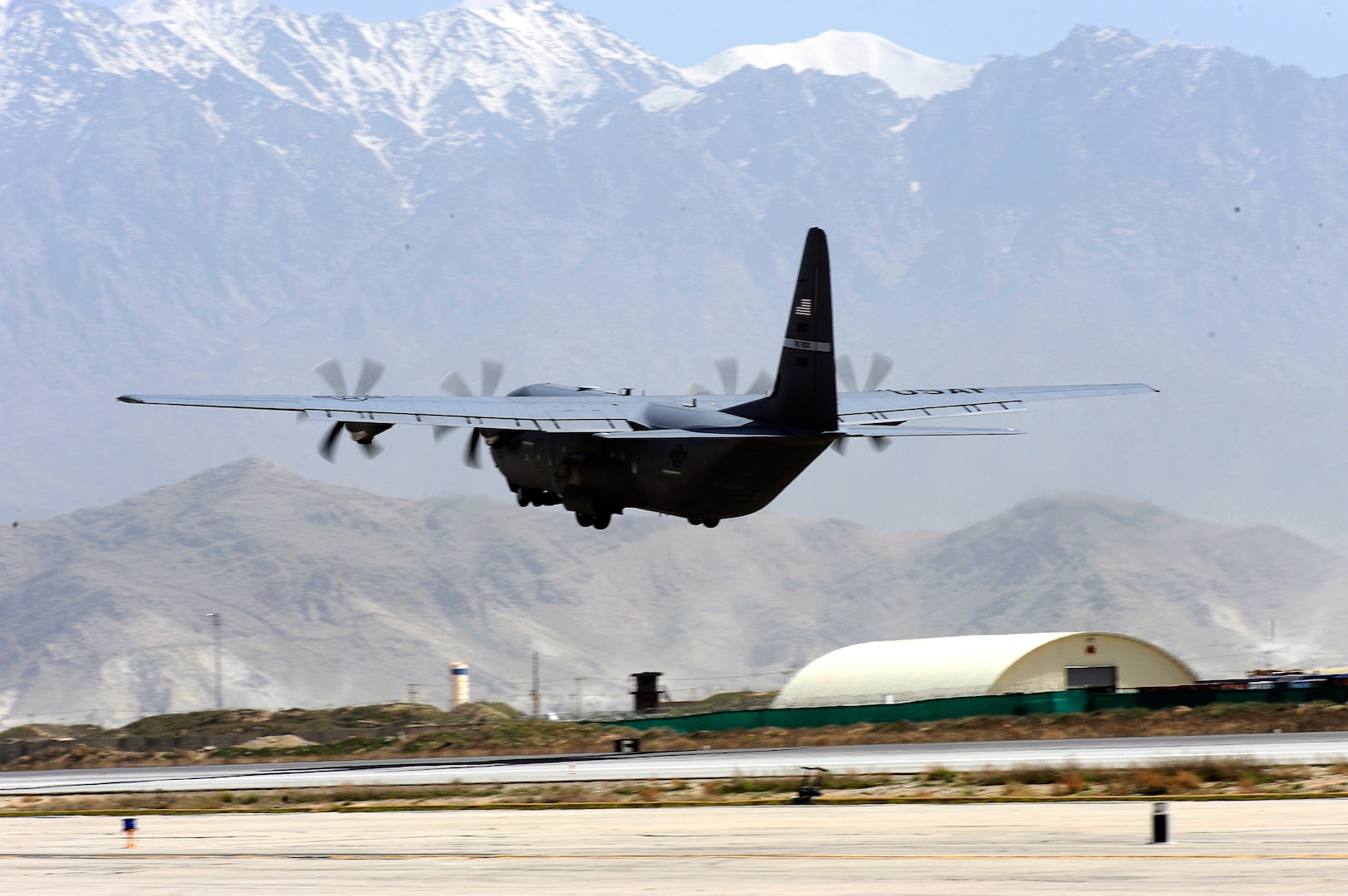 A C-130 Hercules aircraft assigned to the 774th Expeditionary Airlift Squadron launches from Bagram Airfield, Afghanistan. C-130s perform a variety of missions here including strategic airlift, aeromedical evacuation and people transport.