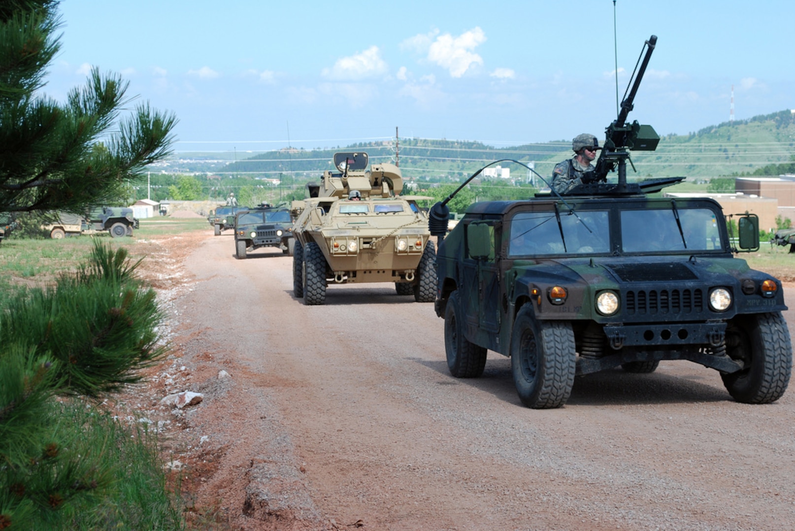 Soldiers with the 191st Military Police Company’s 3rd Platoon convoy to a fuel point after receiving word that there were injured Soldiers there June 16, 2010. The scenario was one of many training situations the Soldiers have encountered during Golden Coyote, a military training exercise hosted by the South Dakota National Guard near Rapid City, S.D. Soldiers with the North Dakota Army National Guard’s 191st Military Police Company have been training alongside nearly 2,200 other service members during the two-week exercise.
