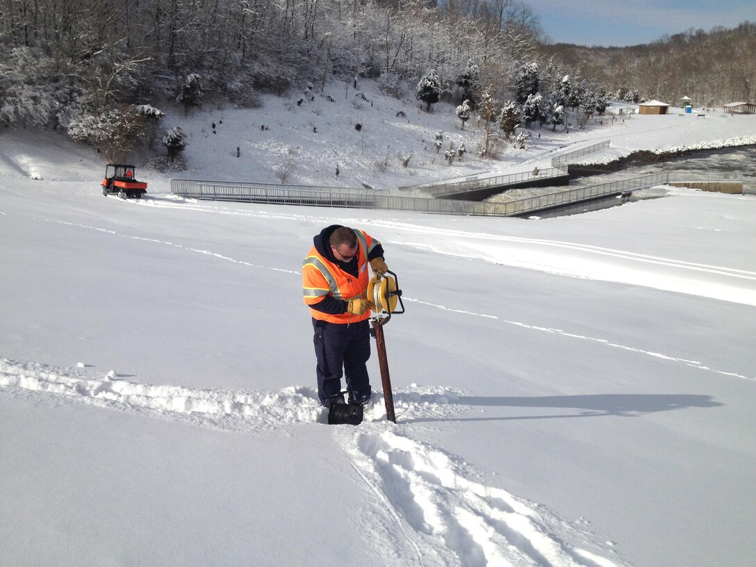Maintenance Mechanic Keith Chaney conducts a safety inspection of the W.H. Harsha Dam on March 6, 2015. Reading the piezometers is necessary after heavy rain and snowfall.