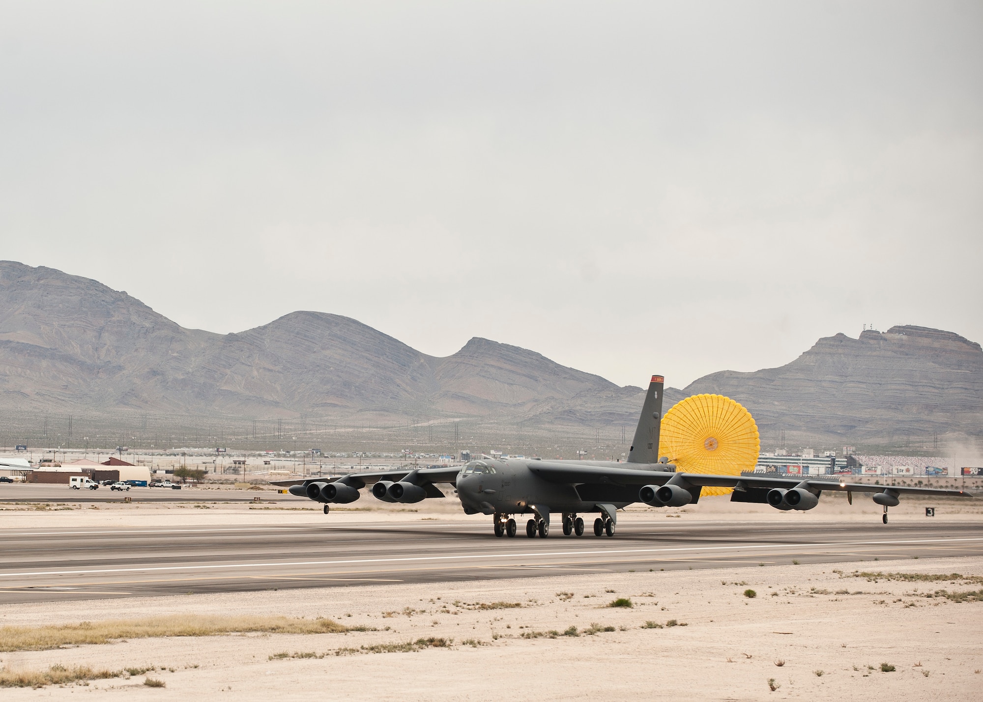 A B-52 Stratofortress assigned to the 23rd Bomb Squadron, Minot Air Force Base, N.D., lands after a Red Flag 15-2 sortie at Nellis AFB, Nev., March 11, 2015. Red Flag involves a variety of attack, fighter, bomber, reconnaissance, electronic warfare, airlift support and search and rescue aircraft. (U.S. Air Force photo by Staff Sgt. Siuta B. Ika)