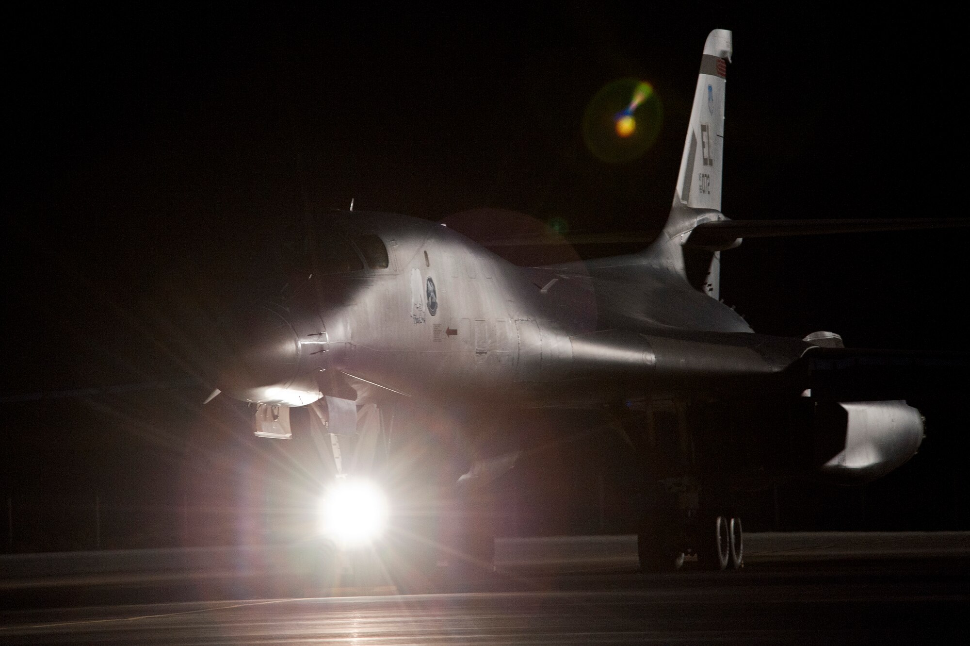 A B-1B Lancer assigned to the 37th Bomb Squadron, Ellsworth Air Force Base, S.D., sits on the tarmac during Red Flag 15-2 at Nellis AFB, Nev., March 10, 2015. Red Flag is a realistic combat training exercise involving the air, space and cyber forces of the U.S. and its allies, and is conducted on the vast bombing and gunnery ranges on the Nevada Test and Training Range. (U.S. Air Force photo by Staff Sgt. Siuta B. Ika)