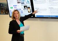 Secretary of the Air Force Deborah Lee James discusses how subject matter experts from the Air Force Nuclear Weapons Center continuously review the effectiveness of the nuclear enterprise during her visit March 9. . James expressed her appreciation to the base leadership for taking care of Airmen, striking the right balance with mission priorities, and making every dollar count.  (U.S. Air Force Photo by Meredith Mingledorff/Released)