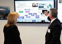 Steve Amburgey, Deputy Program Executive Officer for Strategic Systems, discusses life cycle management for Air Force nuclear weapons with Secretary of the Air Force Deborah Lee James during her March 9 visit to Kirtland Air Force Base, N.M. Strategic Systems provides safe, secure and effective nuclear capabilities to America. Additionally they look for opportunities to improve how the Air Force accomplishes the nuclear mission, ensuring the most effective use of every dollar. (U.S. Air Force Photo by Meredith Mingledorff/Released)